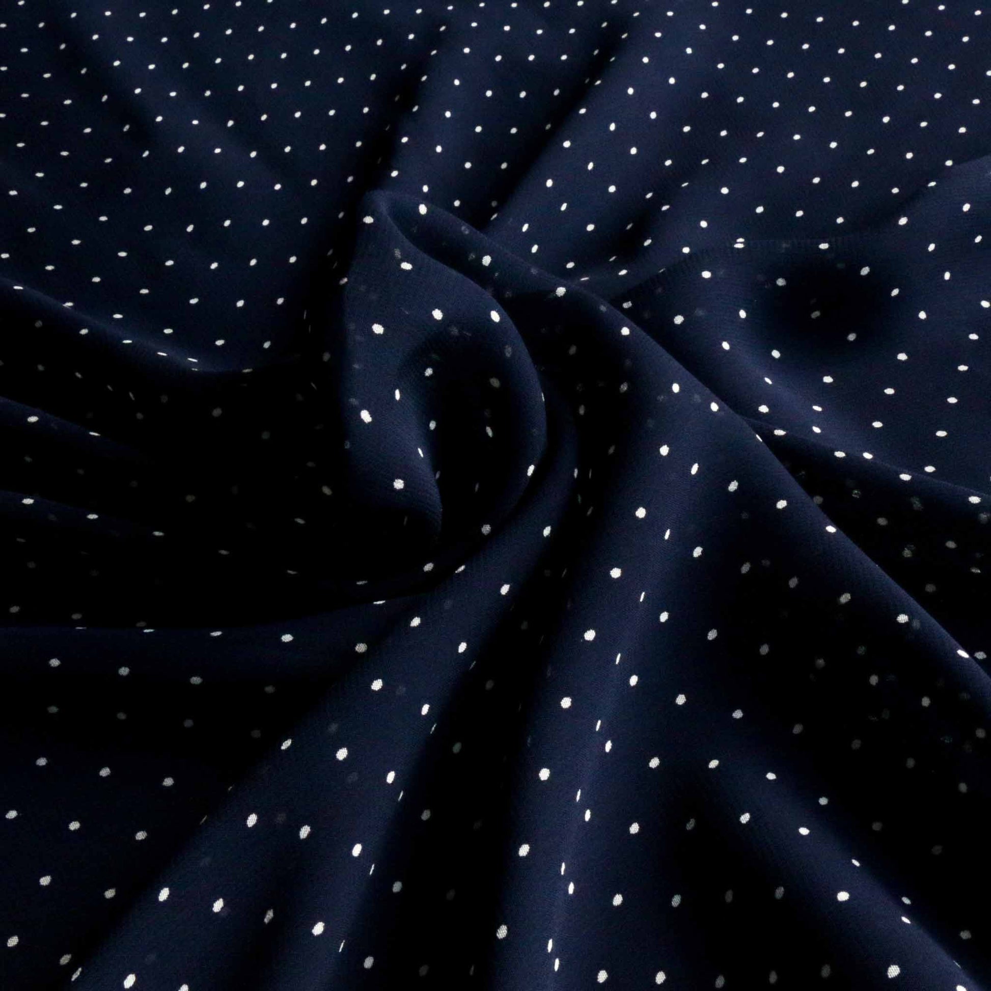blue and white polka dot chiffon viscose dressmaking fabric