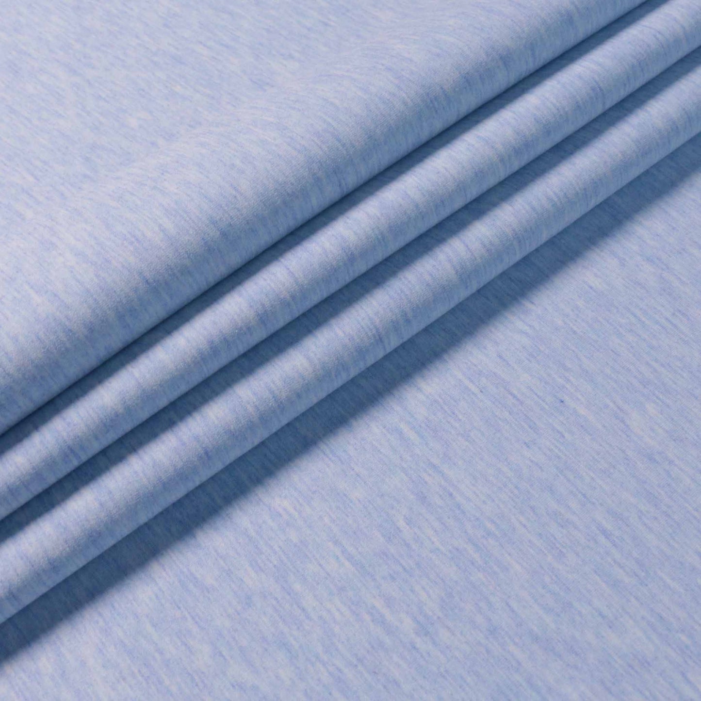 bonded scuba dressmaking fabric in pale blue and white