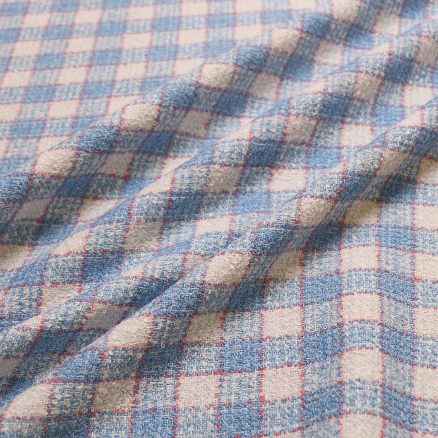 baby blue wool blend boucle dressmaking fabric with check pattern