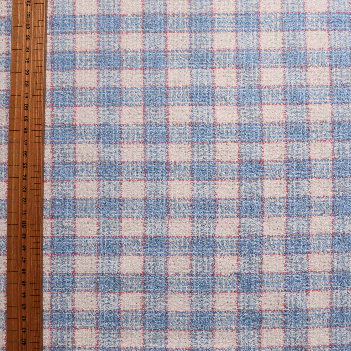 baby blue and white boucle dressmaking fabric with check pattern