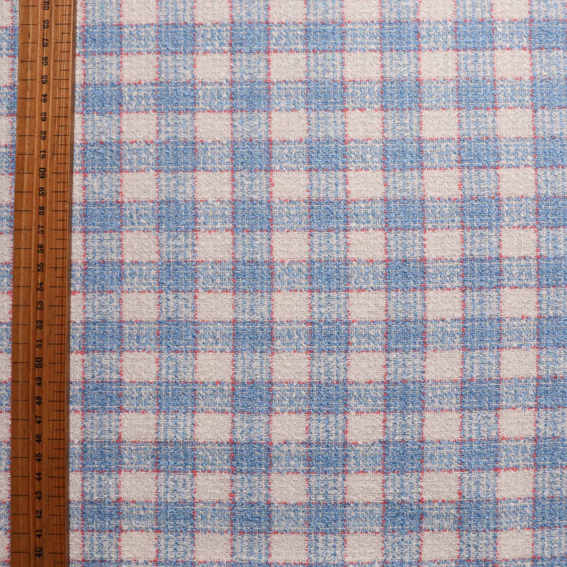 baby blue and white boucle dressmaking fabric with check pattern