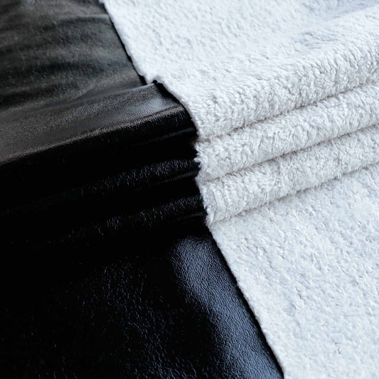 black and cream sherpa fleece pvc dressmaking fabric