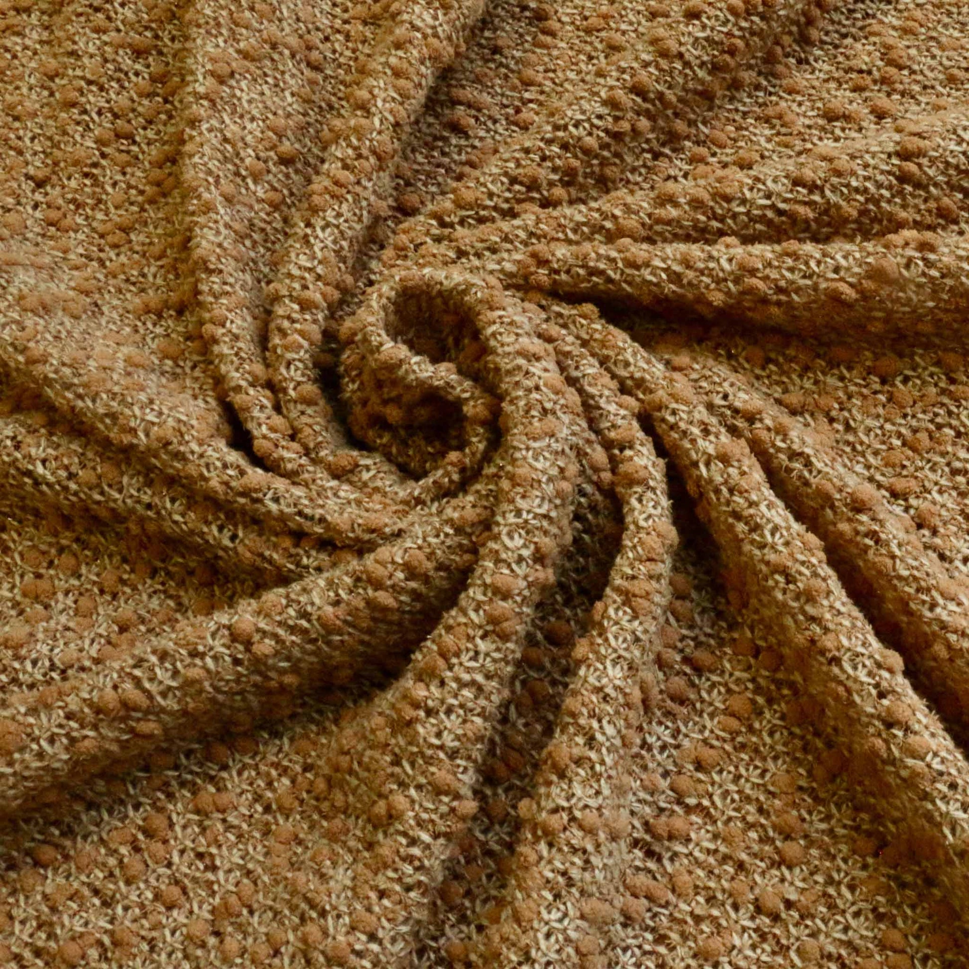 brown boucle jersey dressmaking fabric with bobble texture design