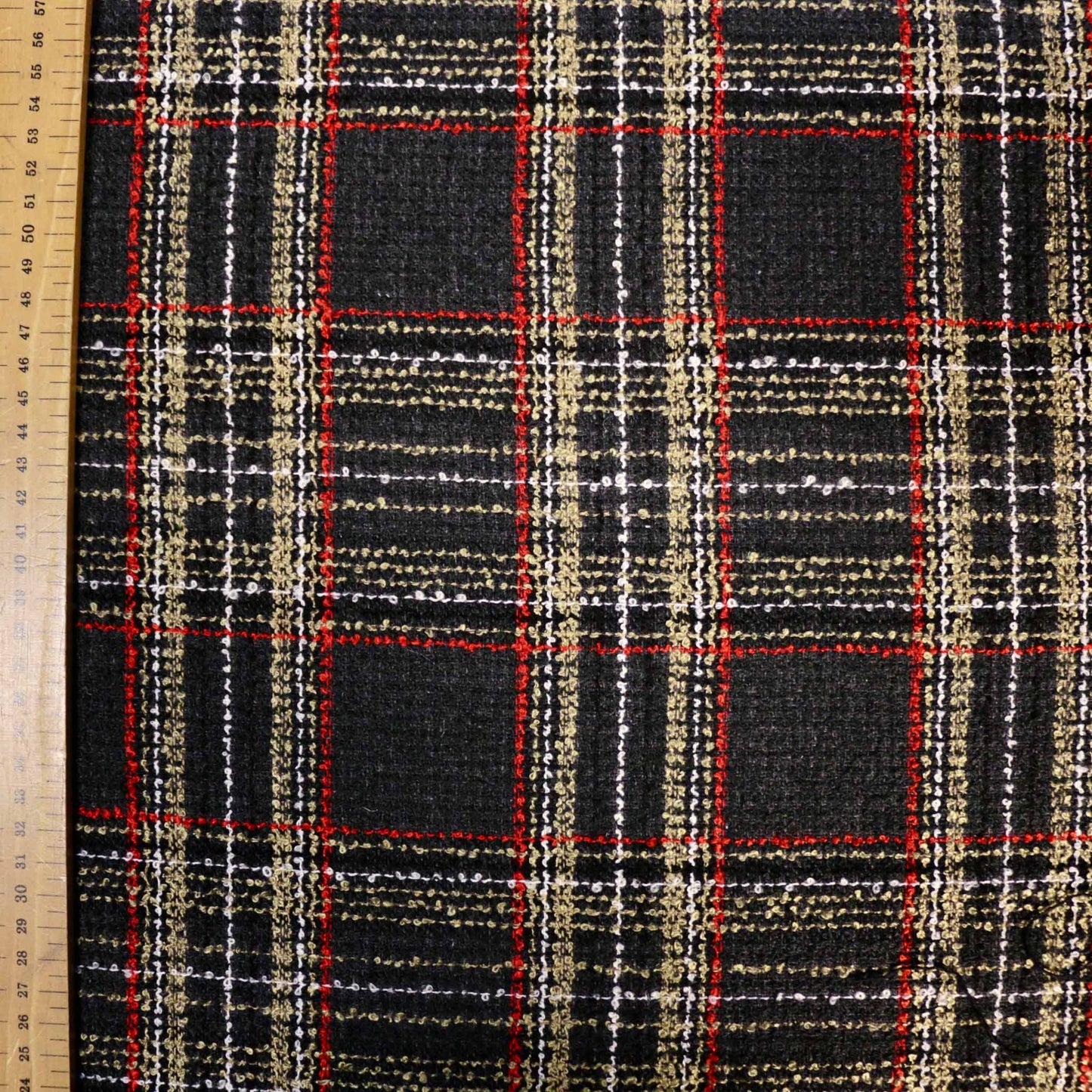 metre wool blend boucle dressmaking fabric with beige and red check pattern on grey