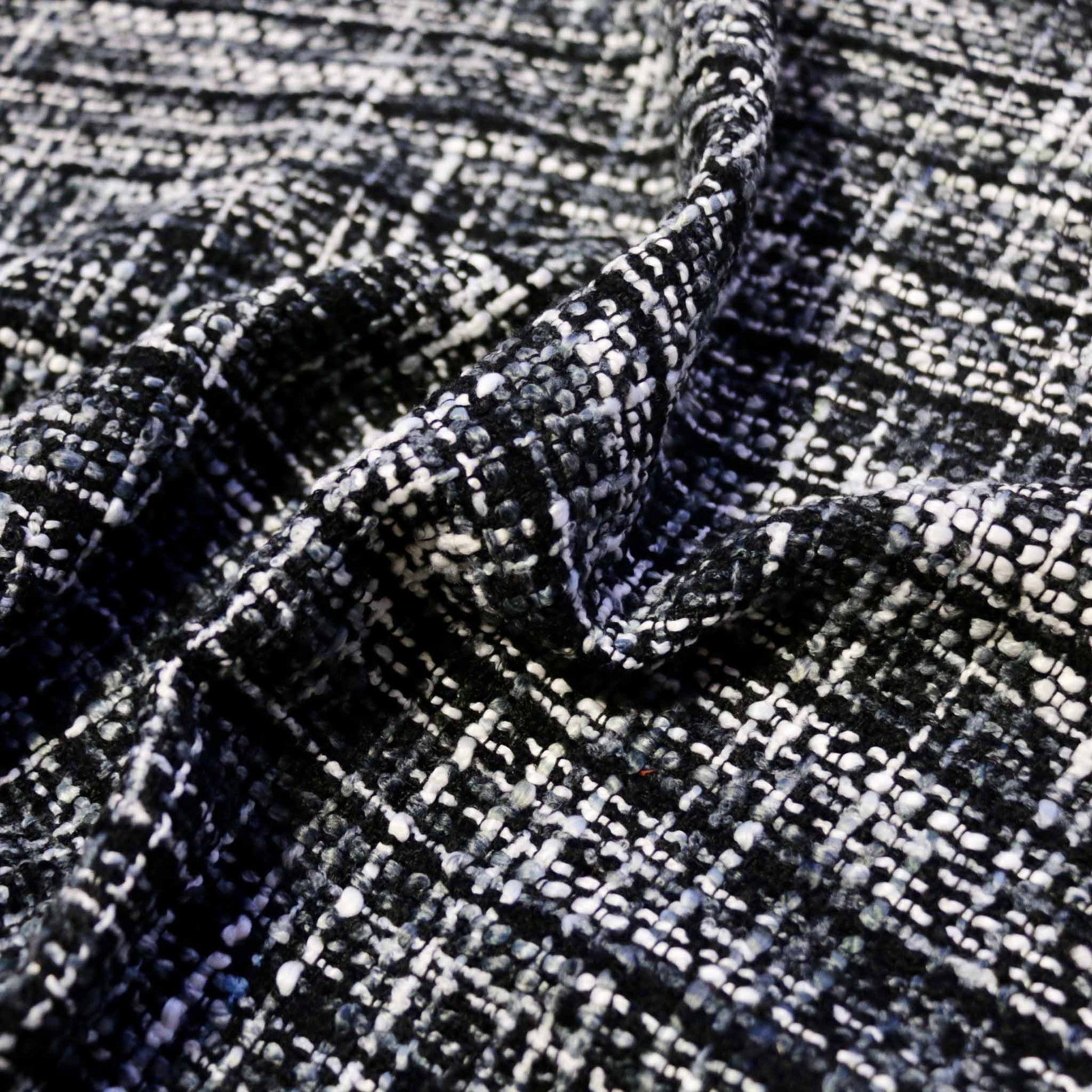 white and blck wool blend basket weave boucle dressmaking fabric