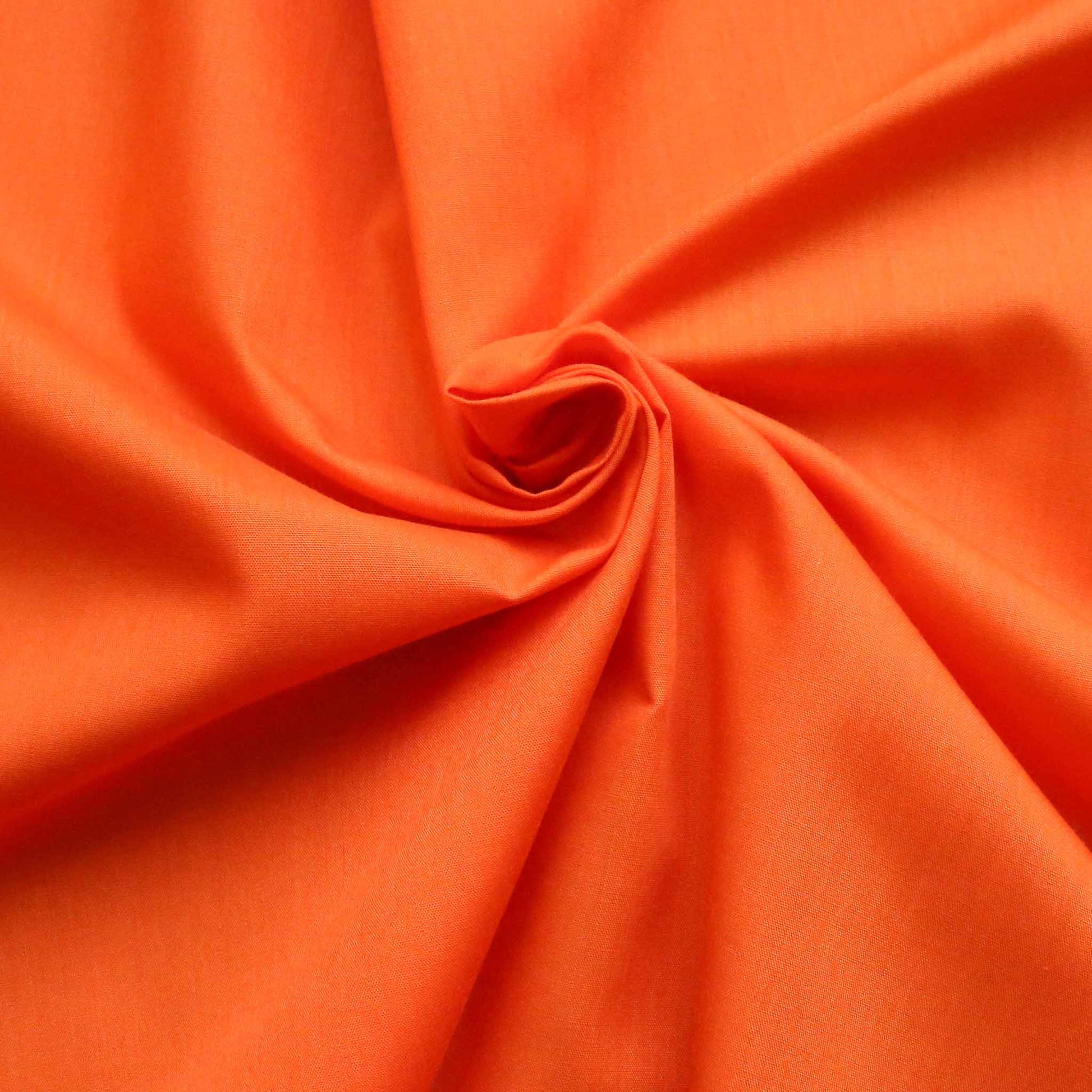 bright orange polycotton fabric for dressmaking and crafting