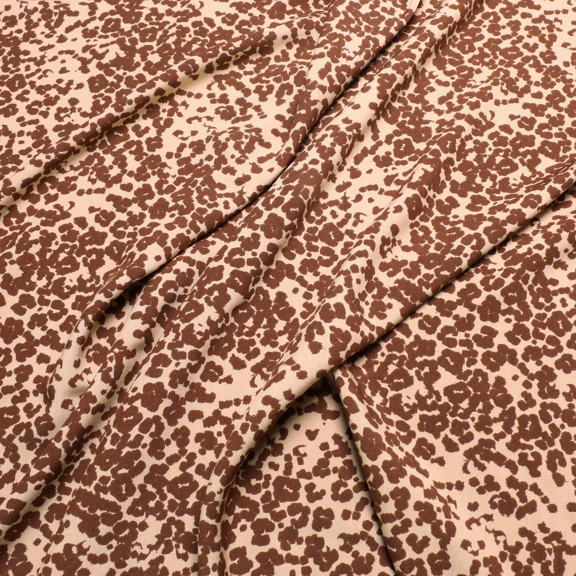 beige and brown animal print viscose challis dressmaking fabric
