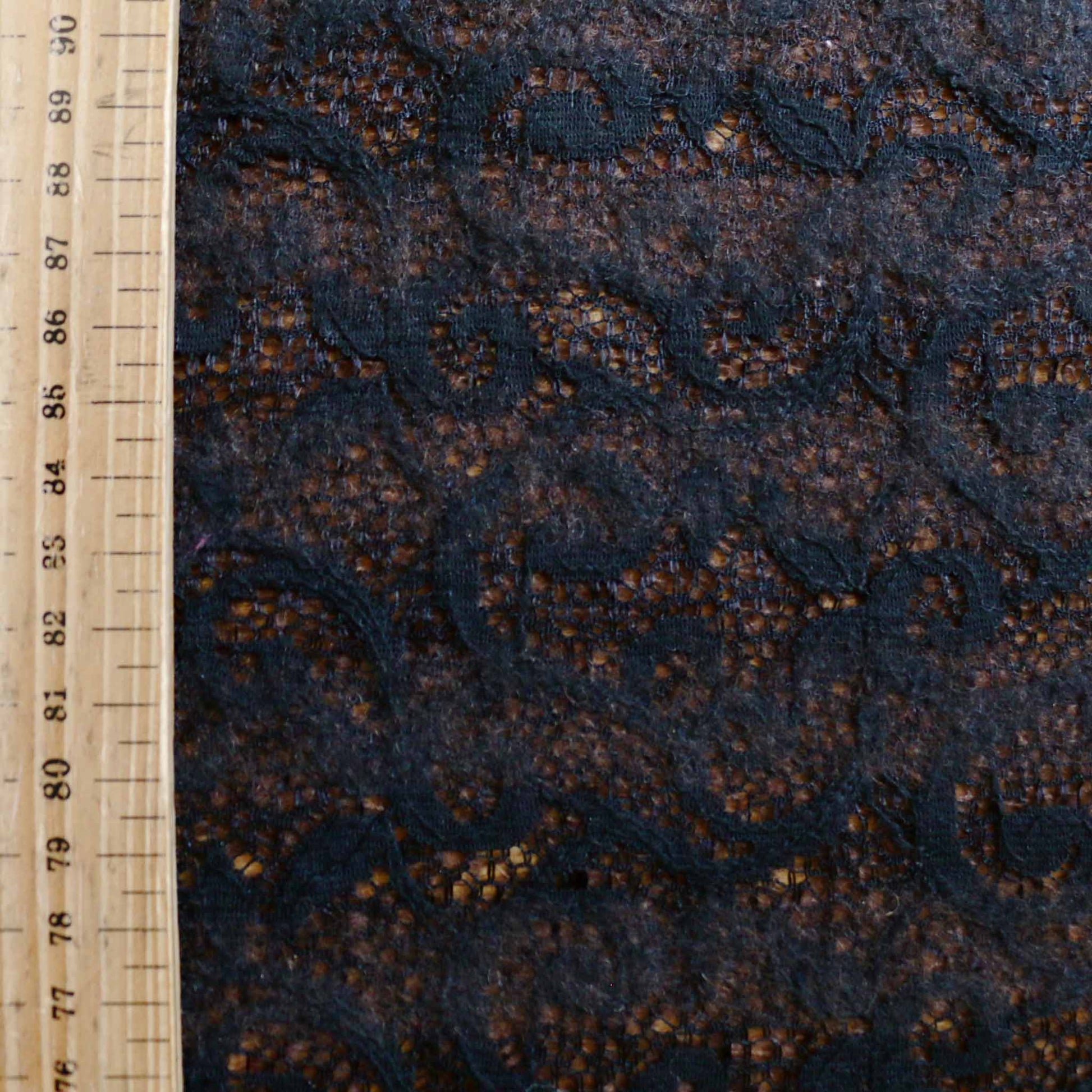metre bonded wool in brown with black lace floral pattern stretchy dressmaking fabric