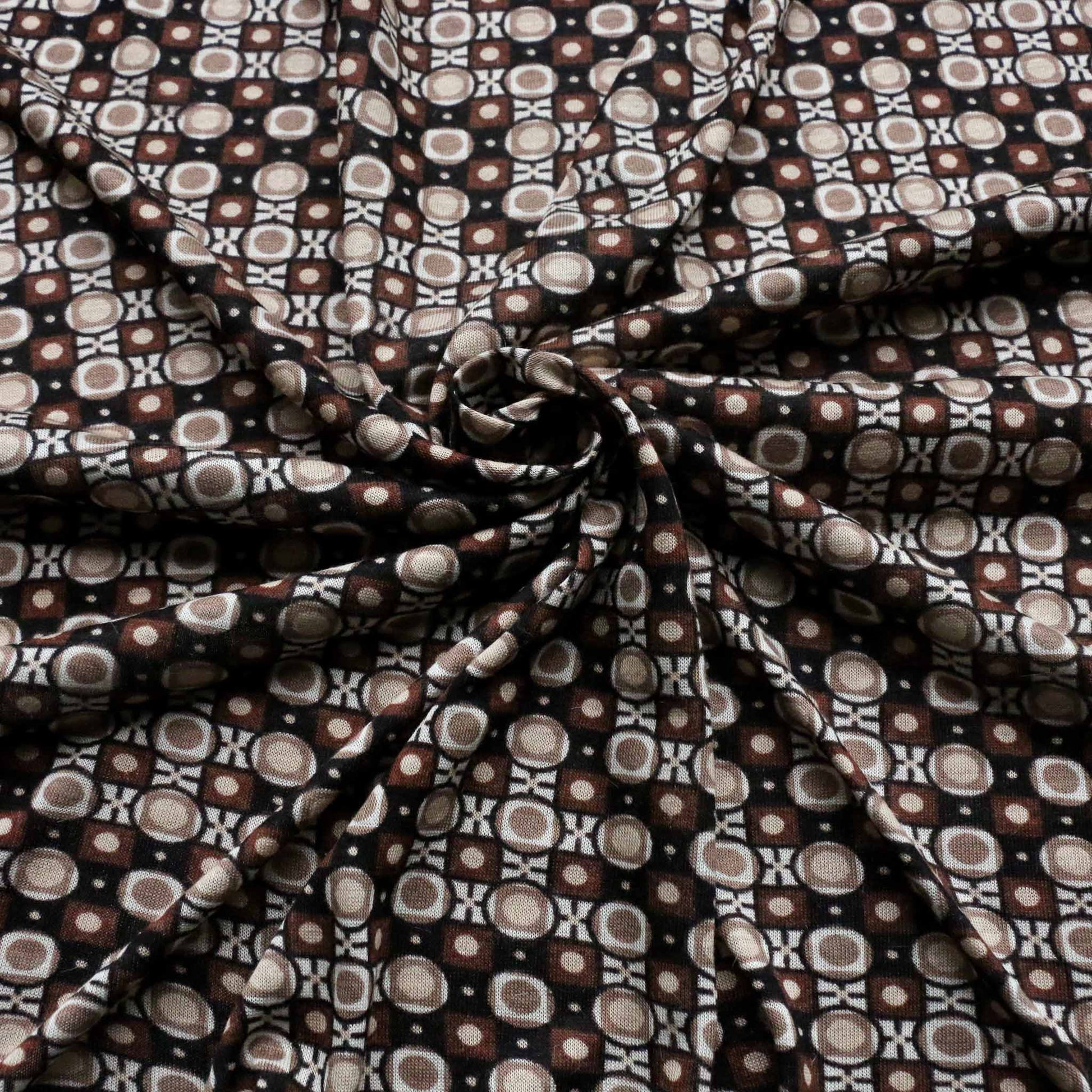 deadstock vintage jersey knit sustainable dressmaking fabric in brown and black with retro print pattern