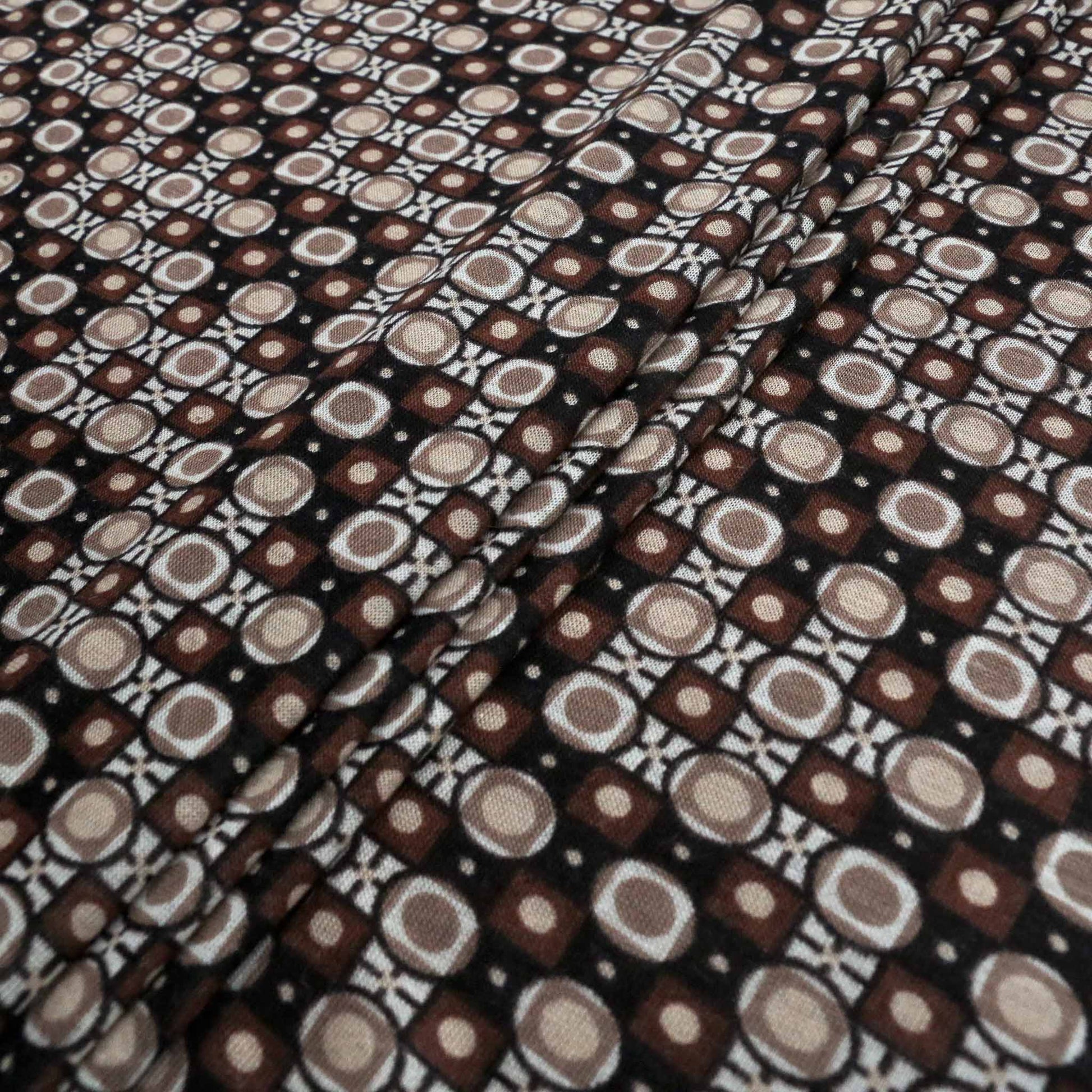 deadstock vintage jersey sustainable dressmaking fabric with printed retro pattern in brown and black