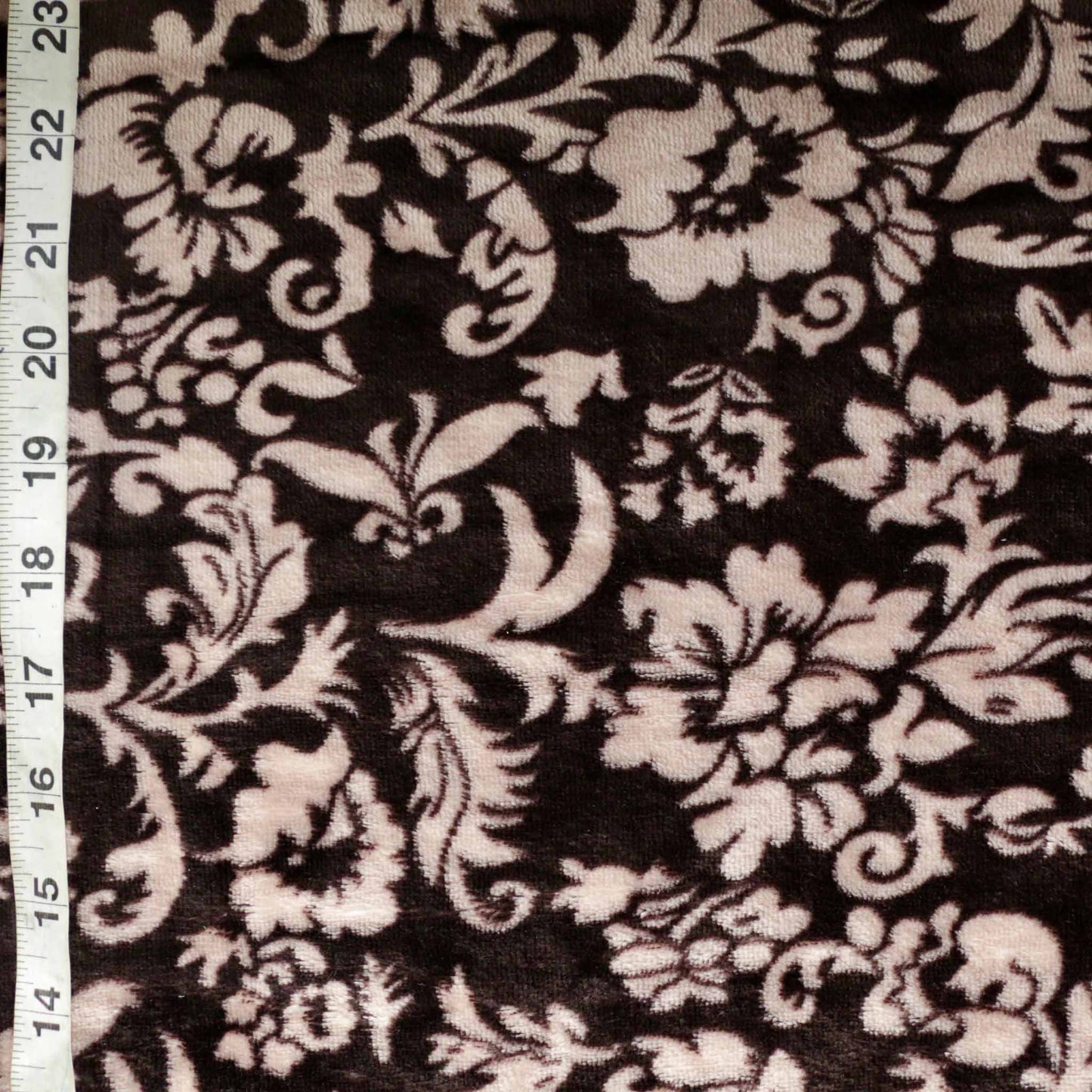 brown fleece with beige flower print dressmaking fabric