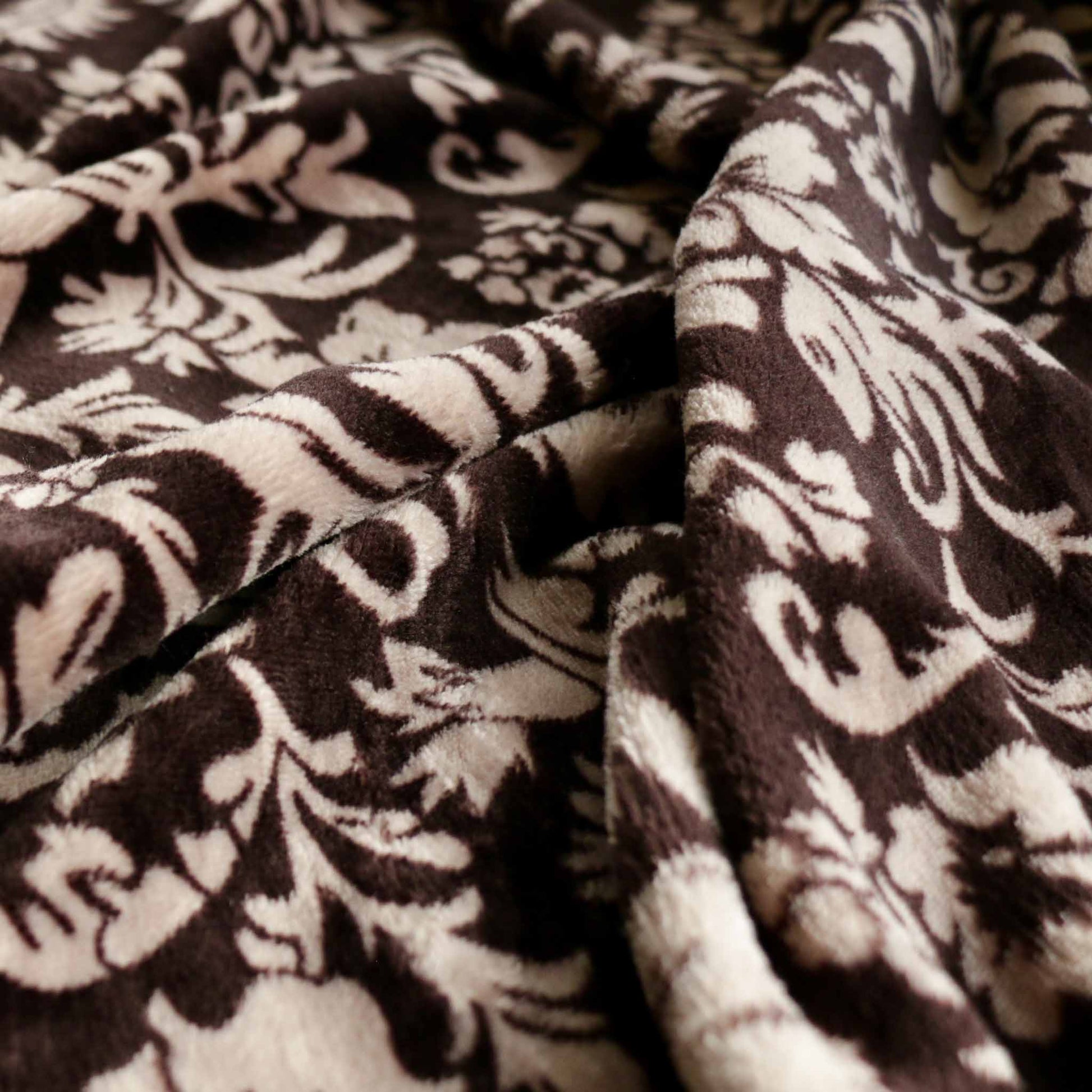 brown fleece dressmaking fabric with beige flower print