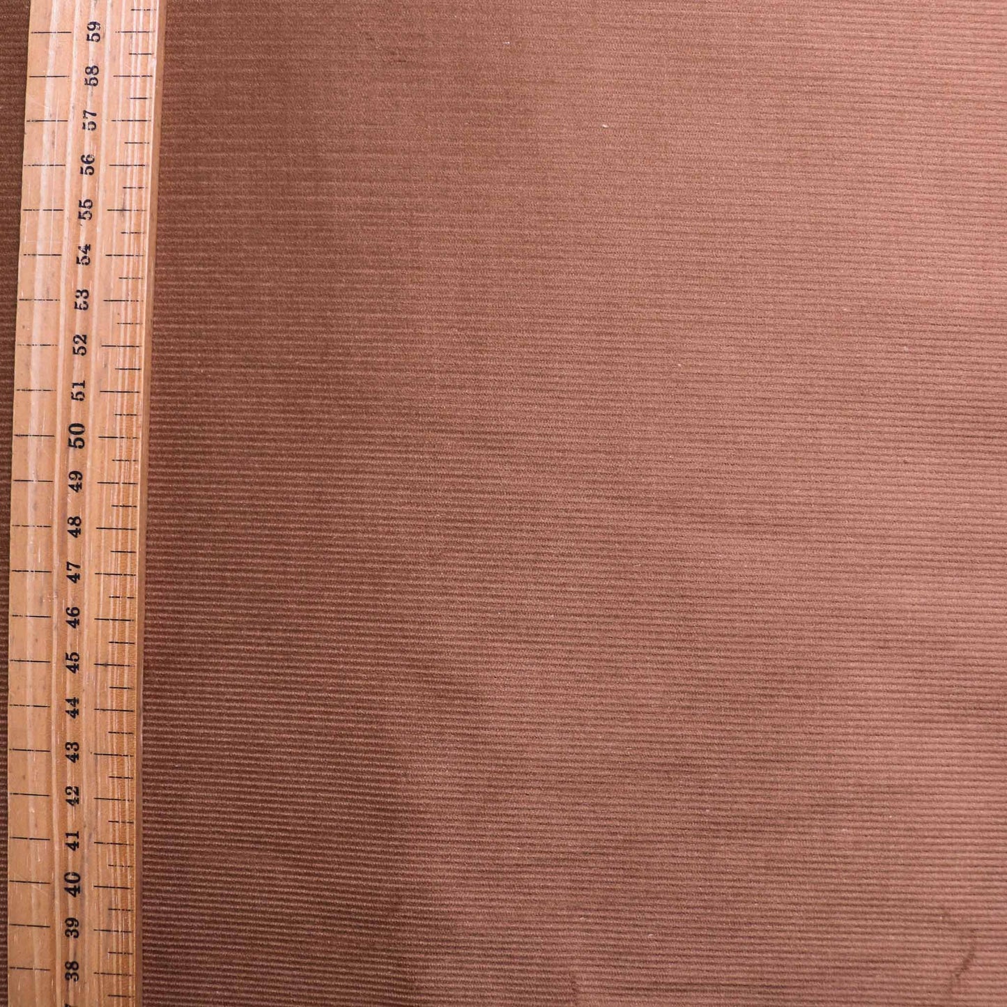 needle corduroy dressmaking fabric in brown colour