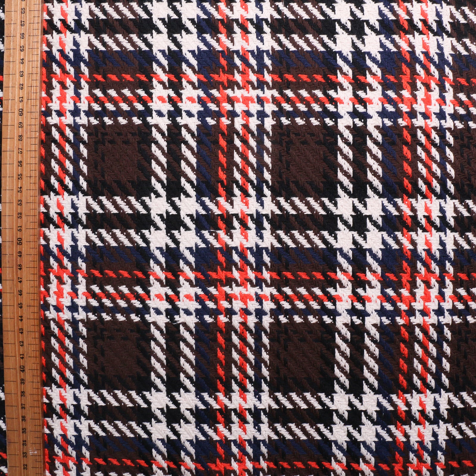 Chanel check boucle fabric for dressmaking in brown orange and white