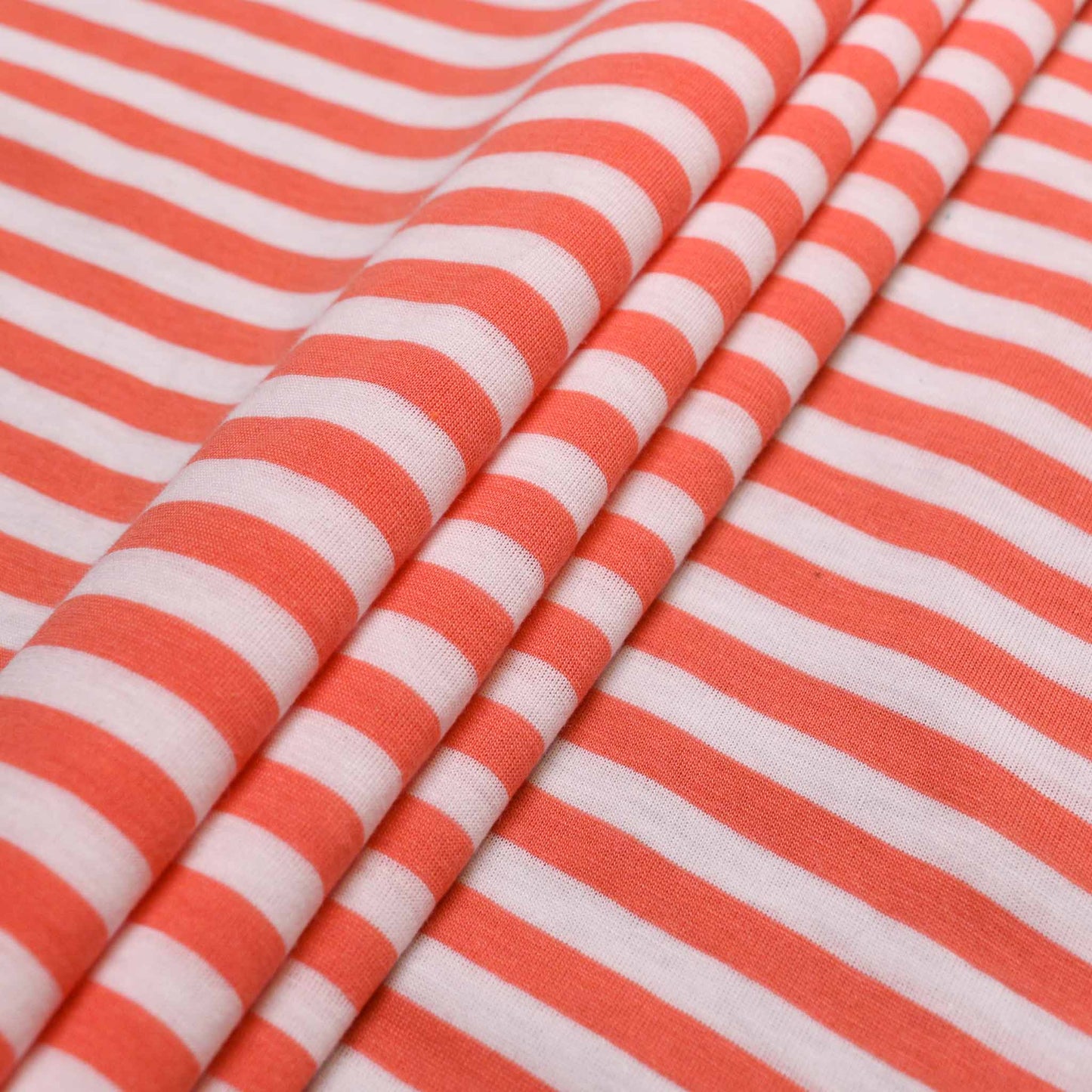 striped polycotton coral orange coloured jersey fabric from cloth control