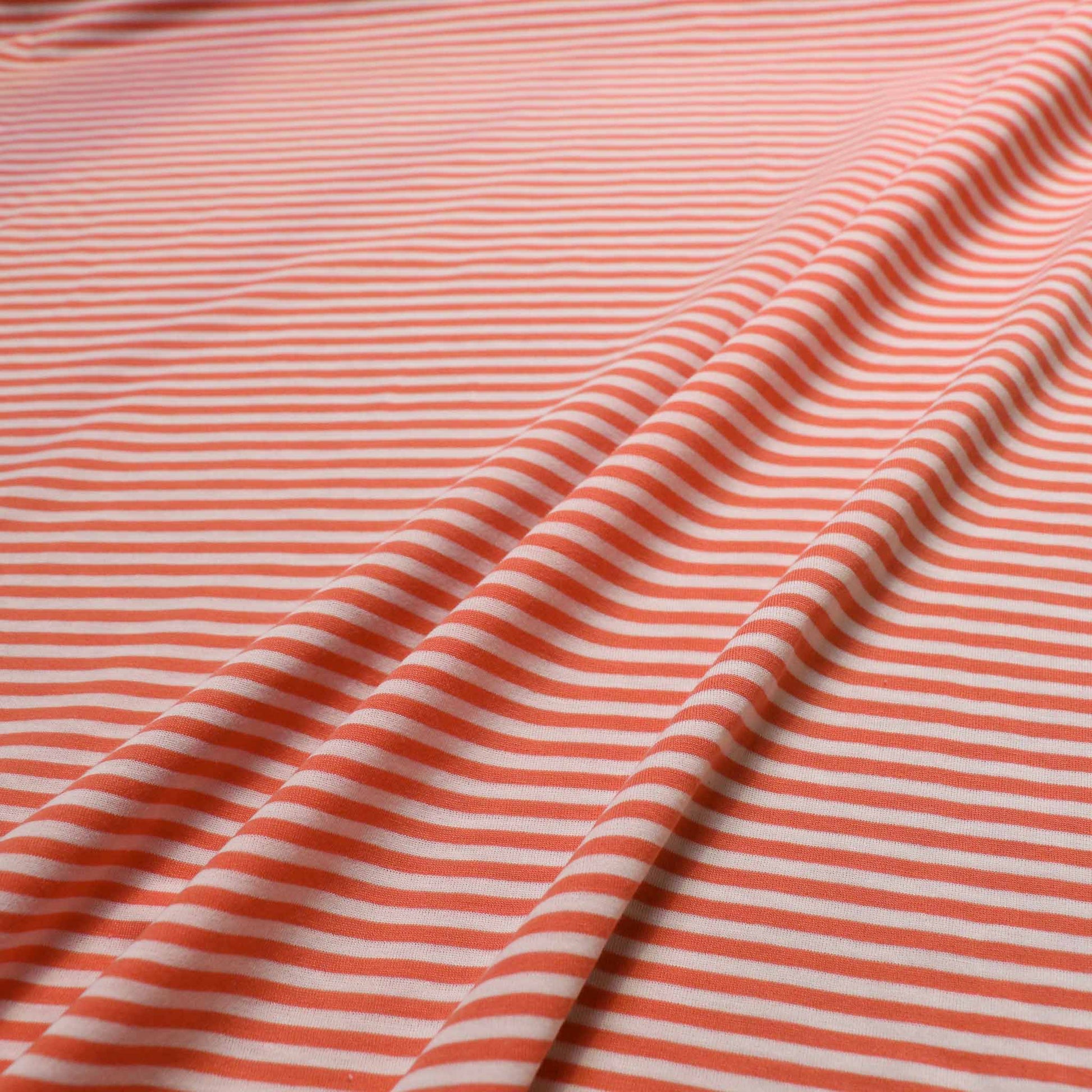 coral orange striped polycotton jersey fabric for dressmaking from cloth control