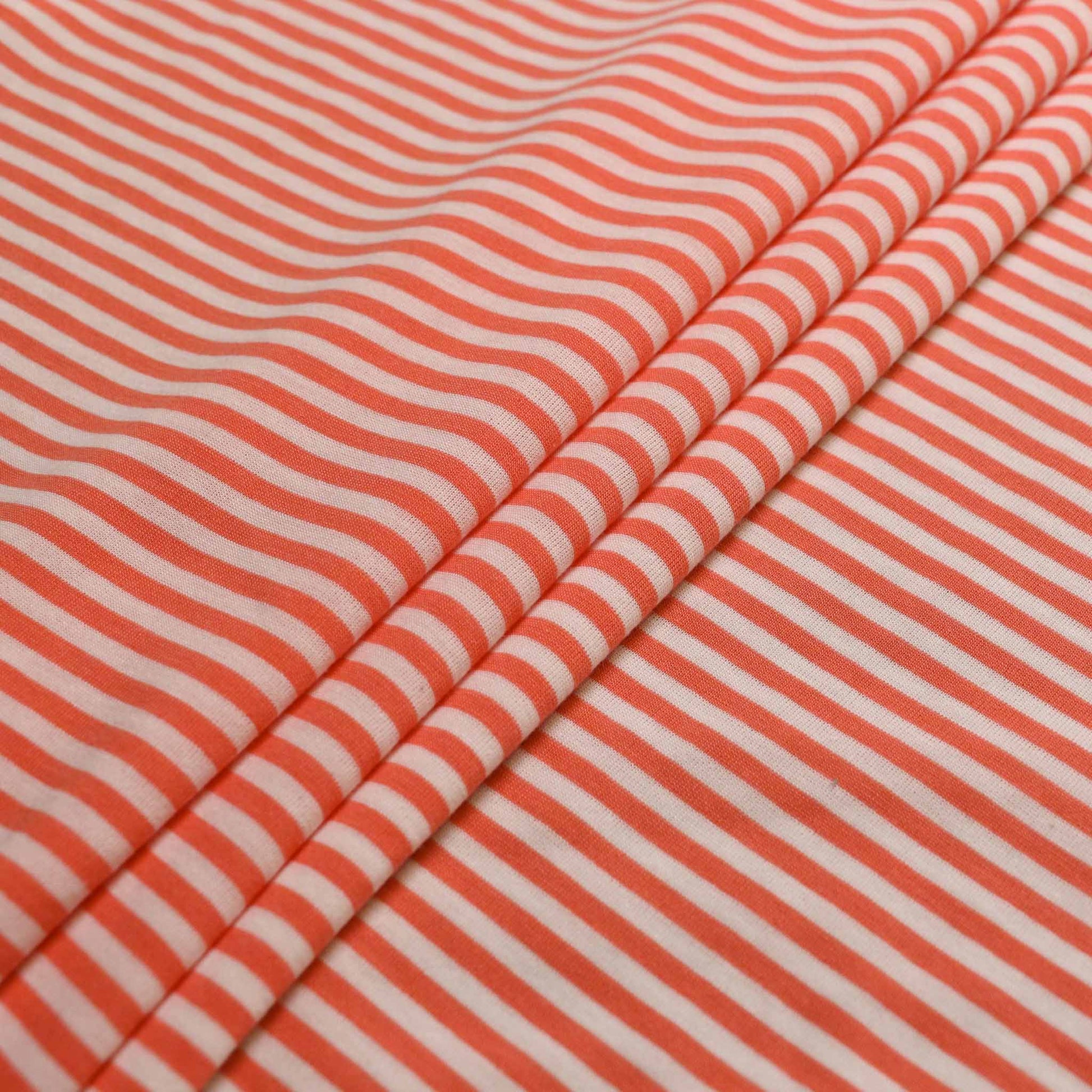 cloth control fabric for dressmaking with coral orange stripes
