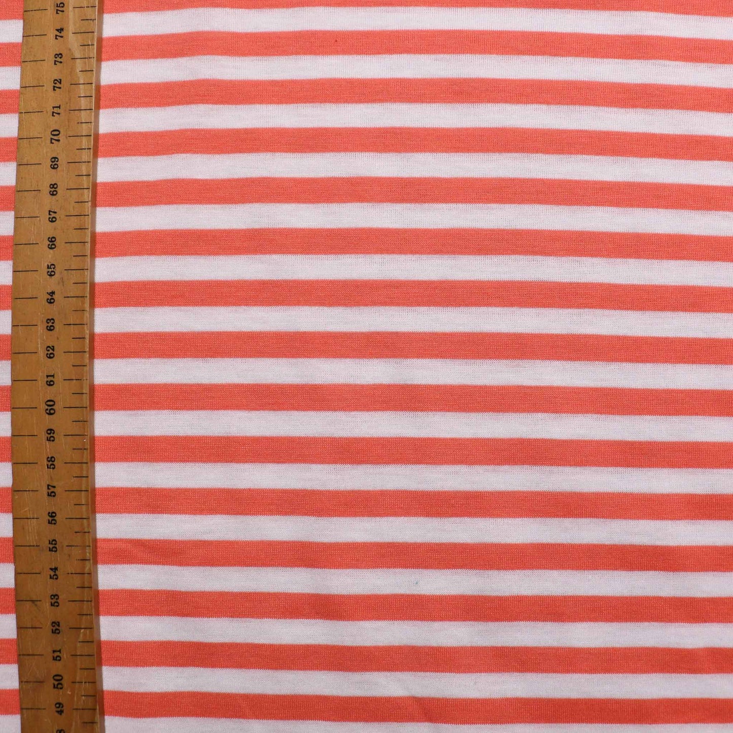 metre dressmaking fabric jersey with coral orange stripes