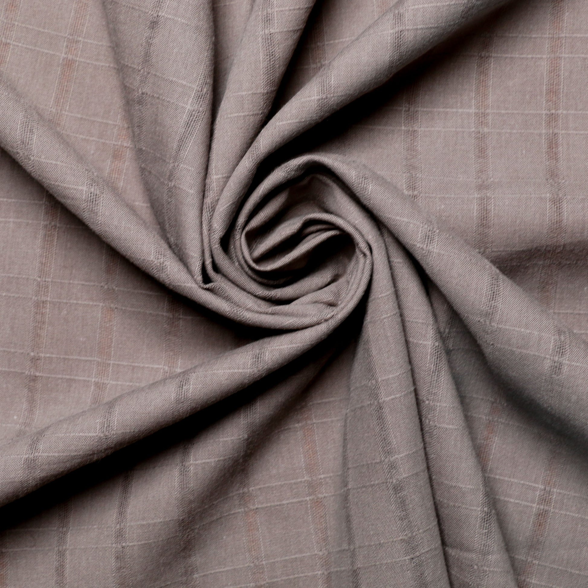 100% cotton voile in brown with jacquard stripe design