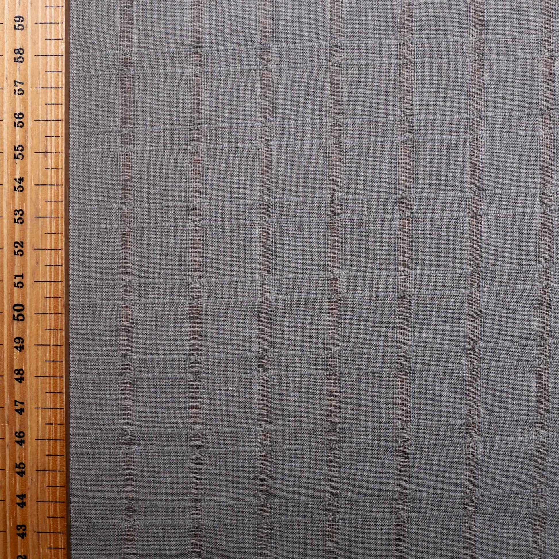 metre of brown cotton dressmaking fabric with jacquard check pattern