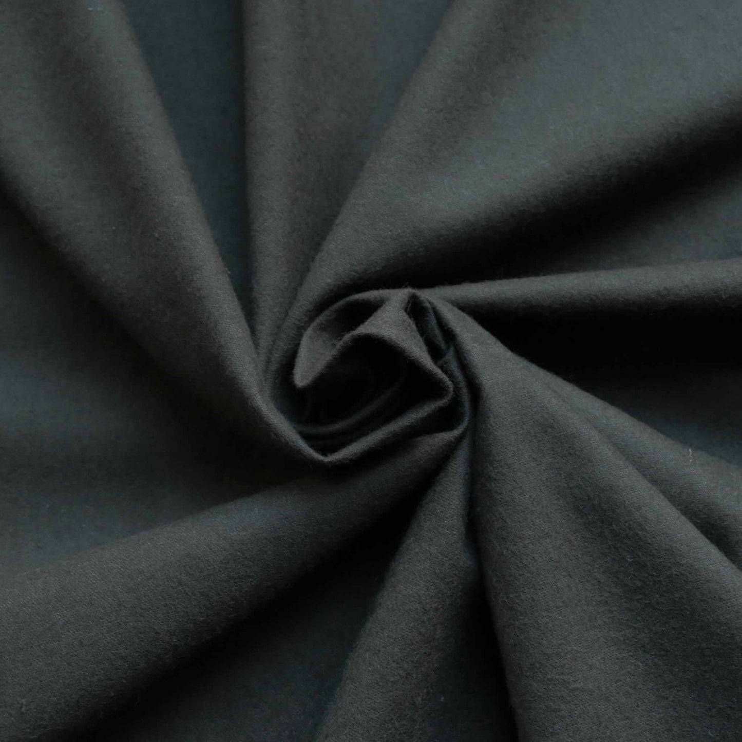 brushed cotton dressmaking fabric in dark green colour