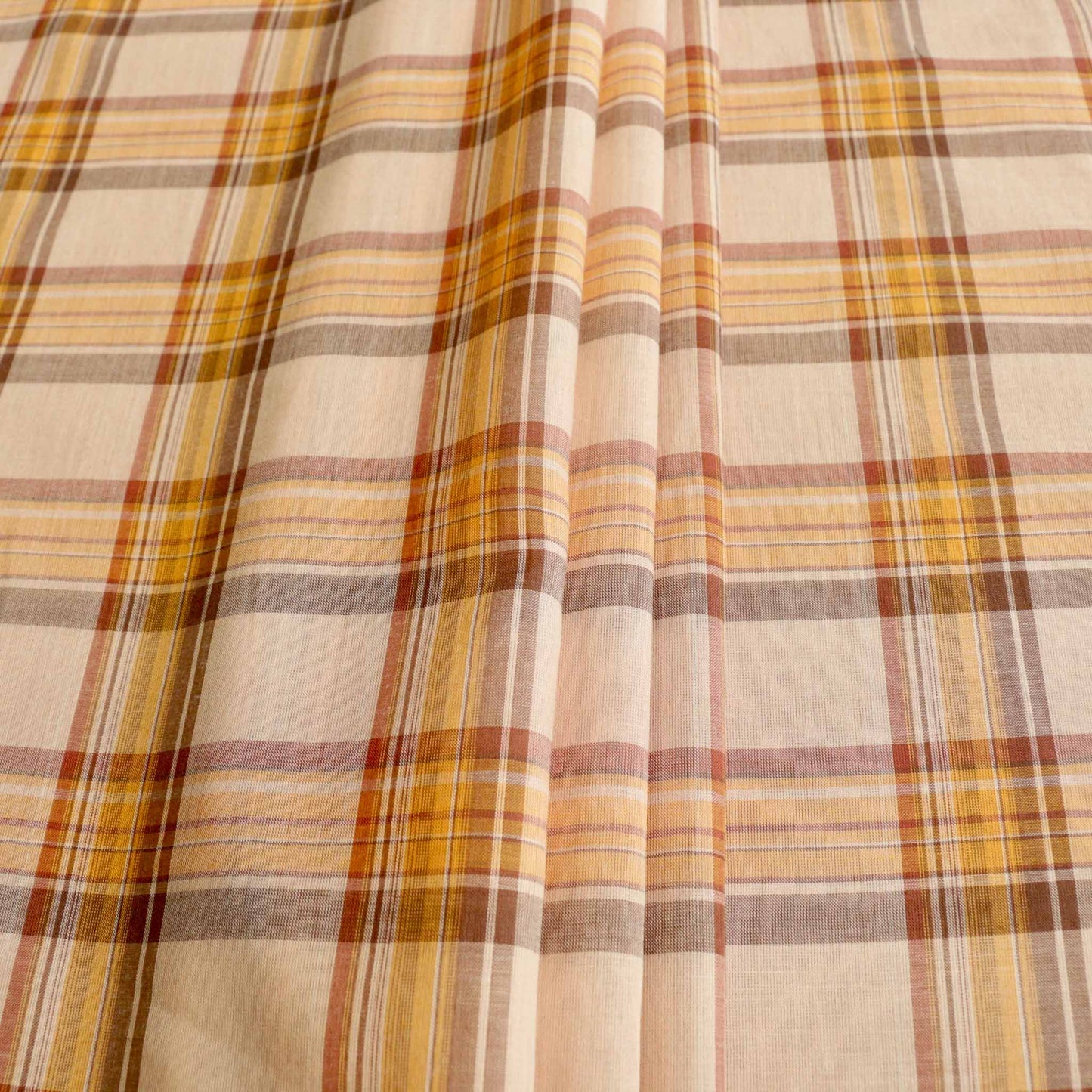 vintage cotton check pattern dressmaking fabric in pale beige colour