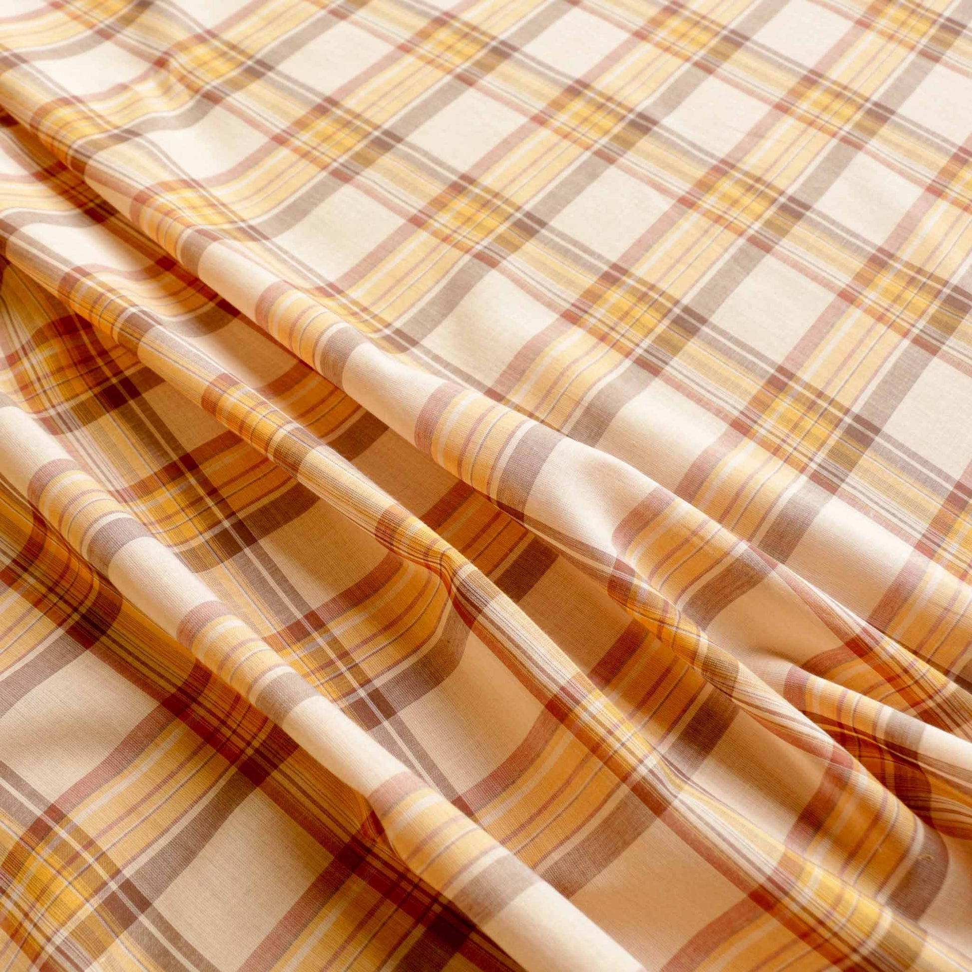 cotton lawn dressmaking fabric with light brown check design