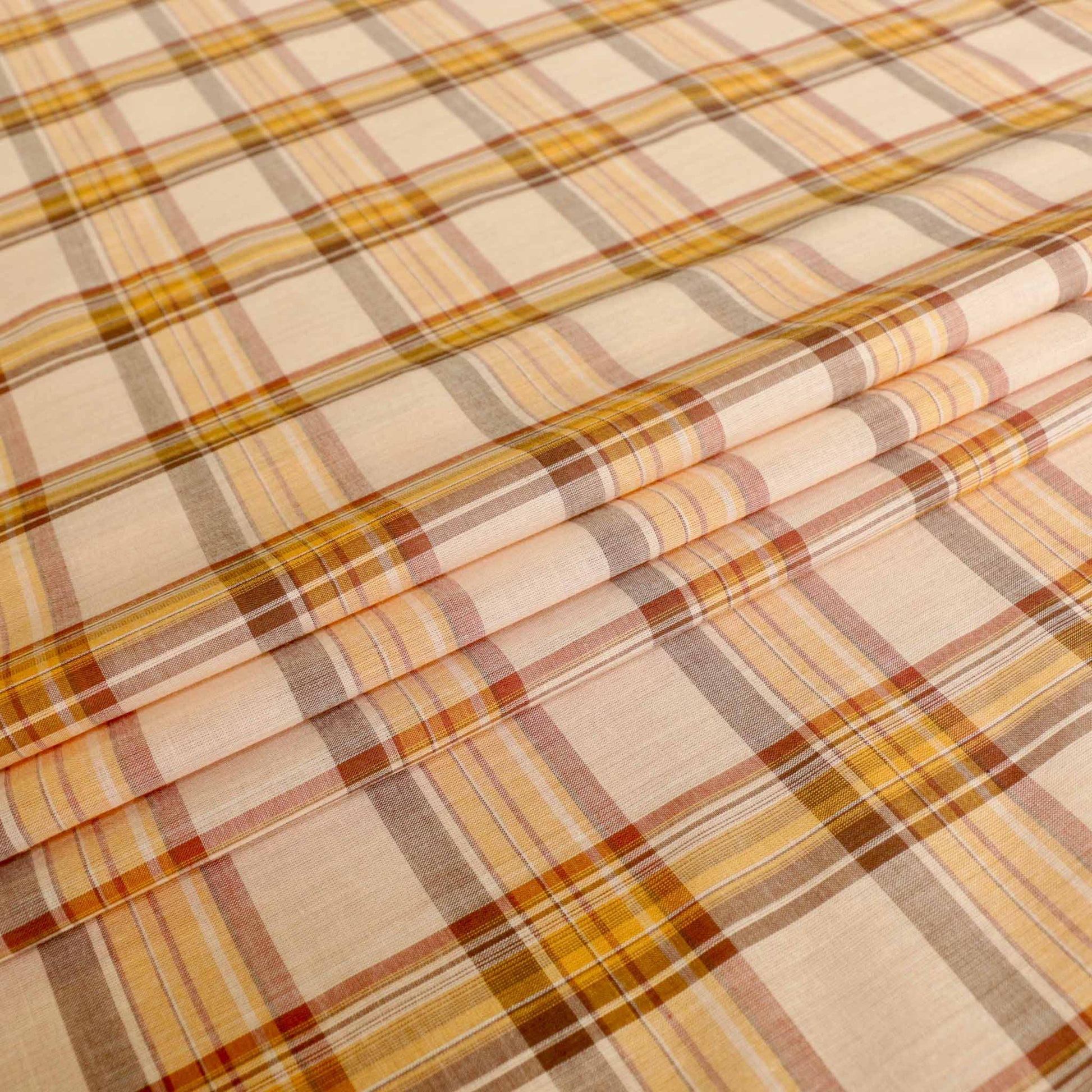folded check pattern pale brown cotton lawn dressmaking fabric