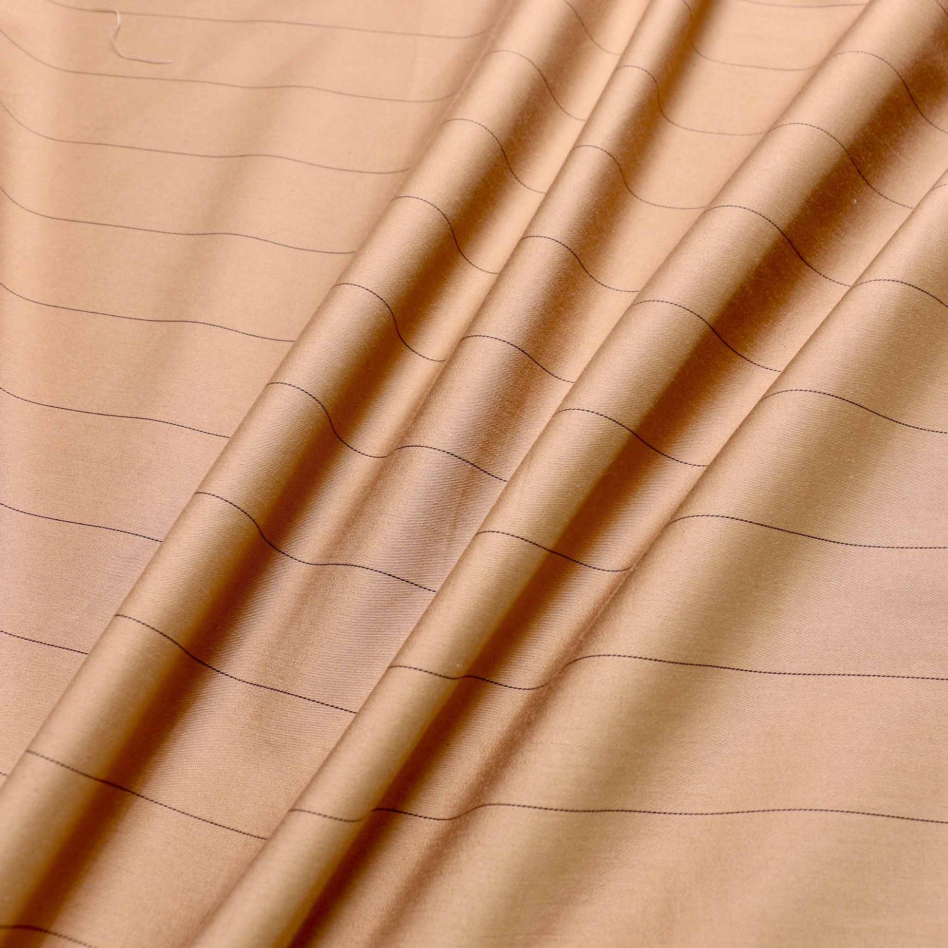 beige suiting cotton sateen dressmaking fabric with pencil thin black pinstripe design