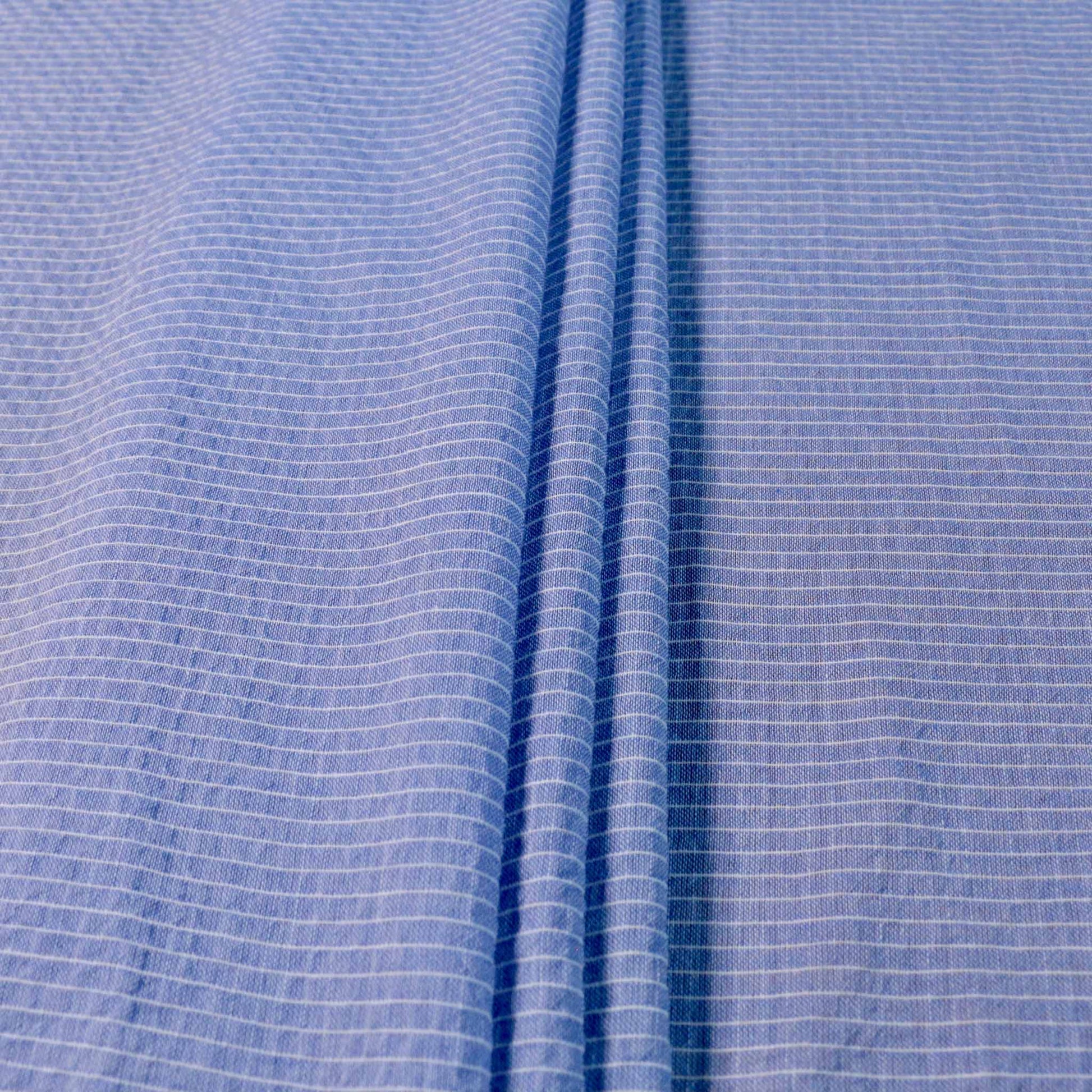 white stripe on blue cotton voile lawn dressmaking fabric