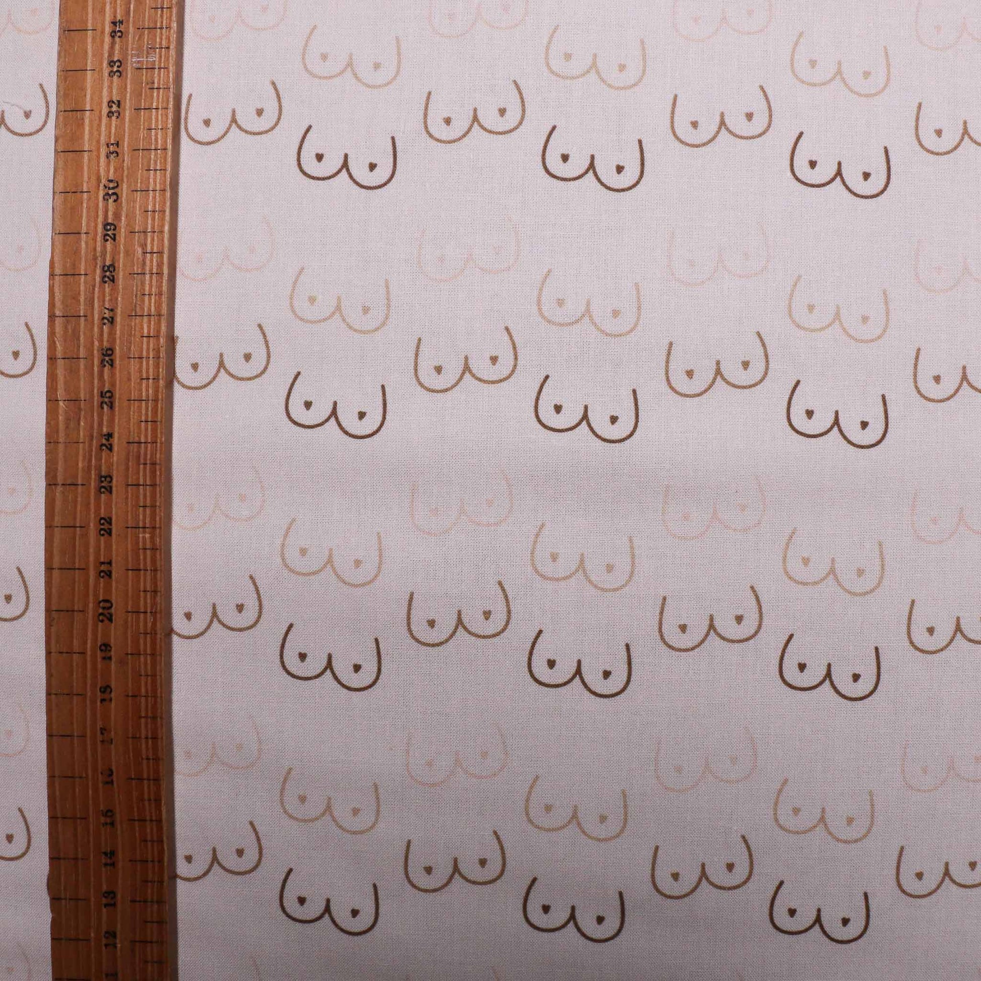 metre pure cotton dressmaking fabric with cheeky boobie pattern