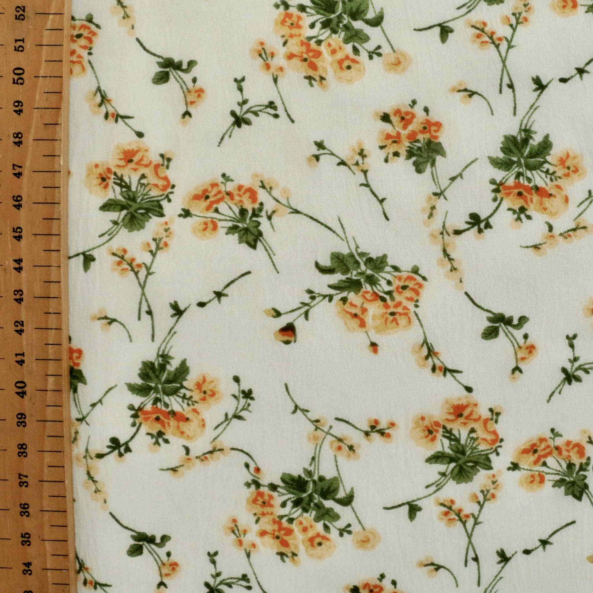 metre cream floral chiffon polyester dressmaking fabric with green and yellow floral print