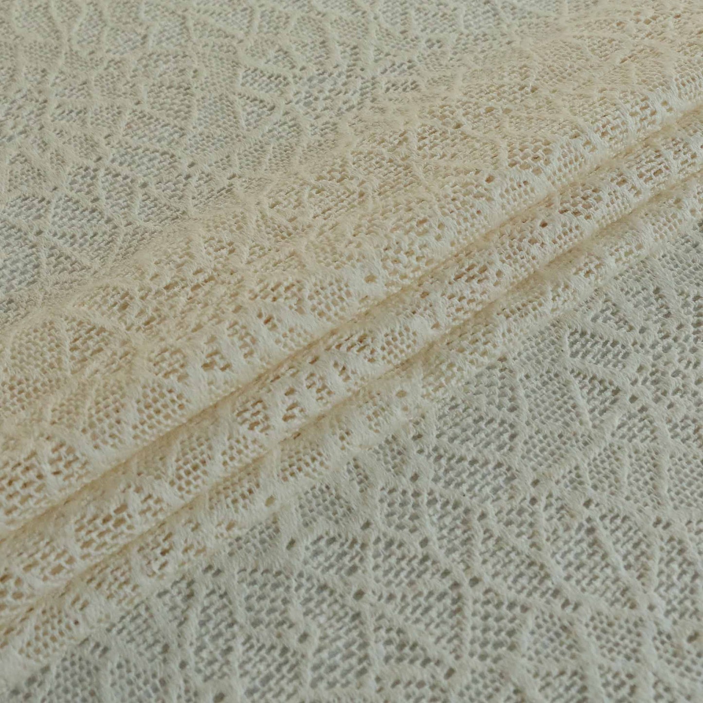 cream lace embroidery dressmaking fabric