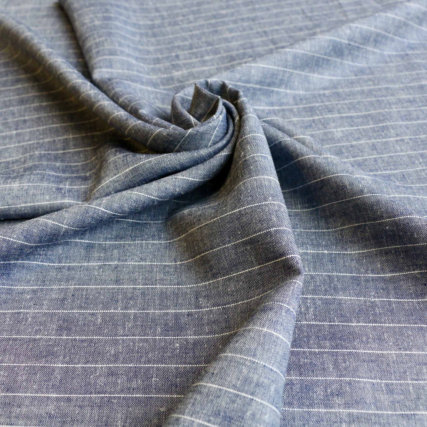 denim blue linen viscose suiting fabric for dressmaking with pinstripe design