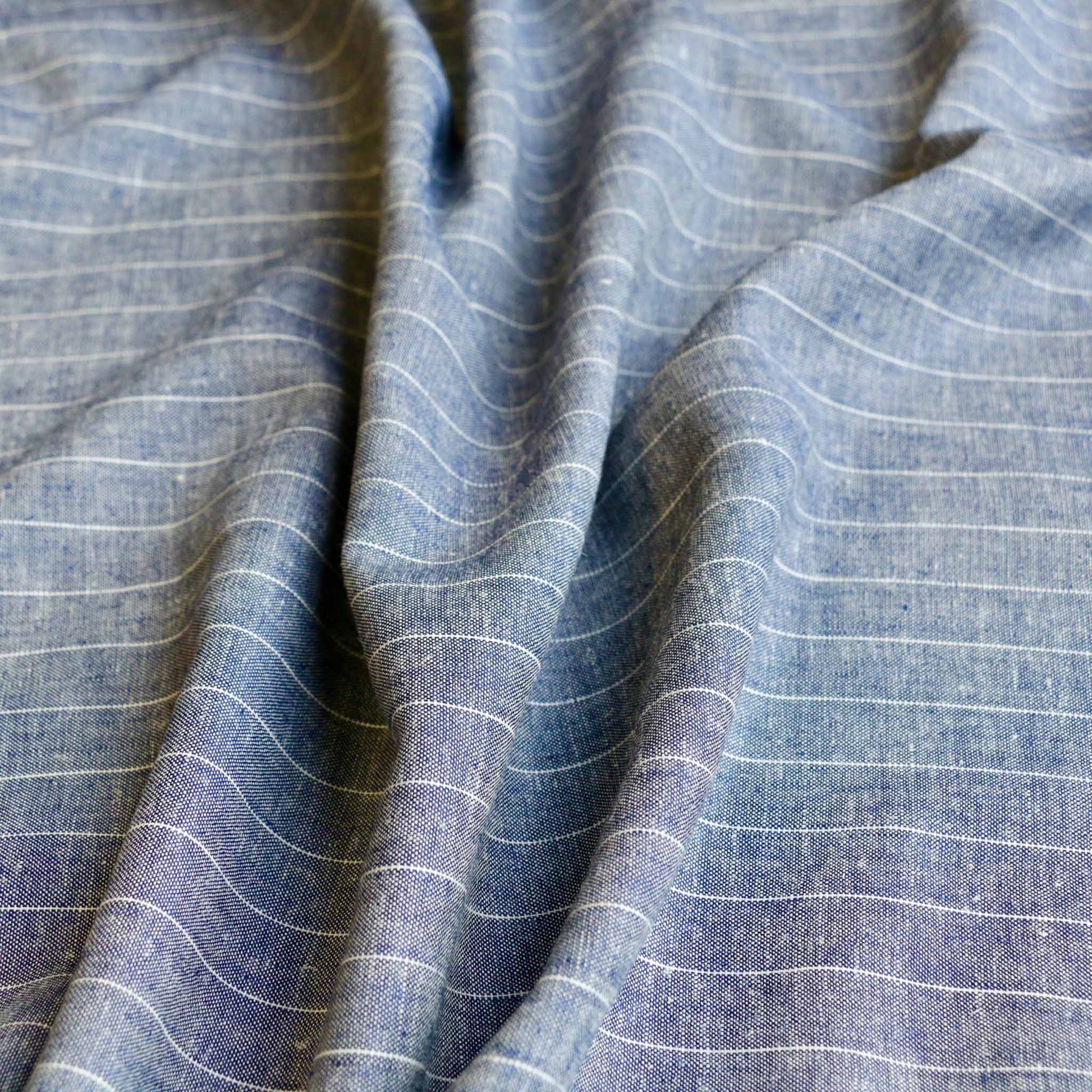 pinstripe linen viscose suiting fabric for dressmaking in denim blue colour
