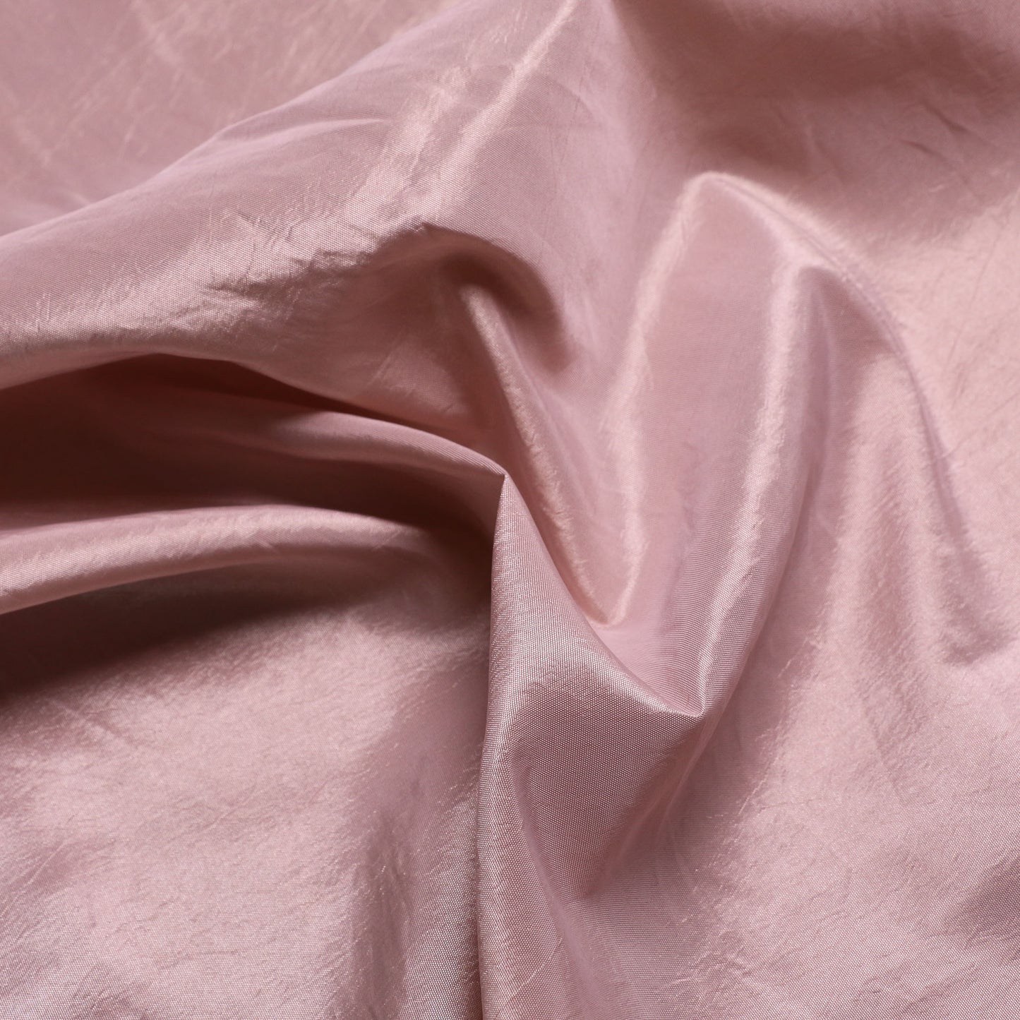dusty pink synthetic dressmaking taffeta fabric