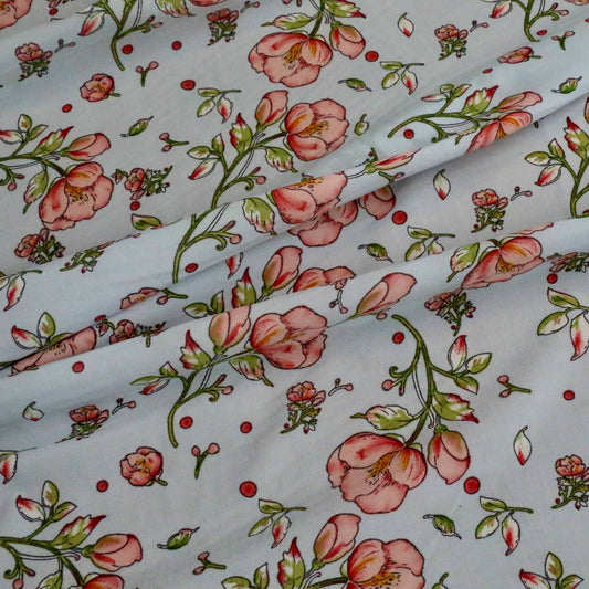 pale blue chiffon polyester dressmaking stretchy fabric with flower print in pink