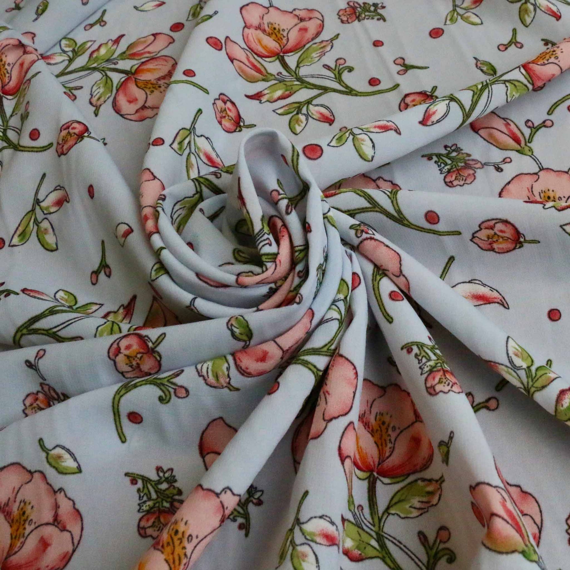 chiffon polyester stretchy dressmaking fabric in white with pink floral flower print