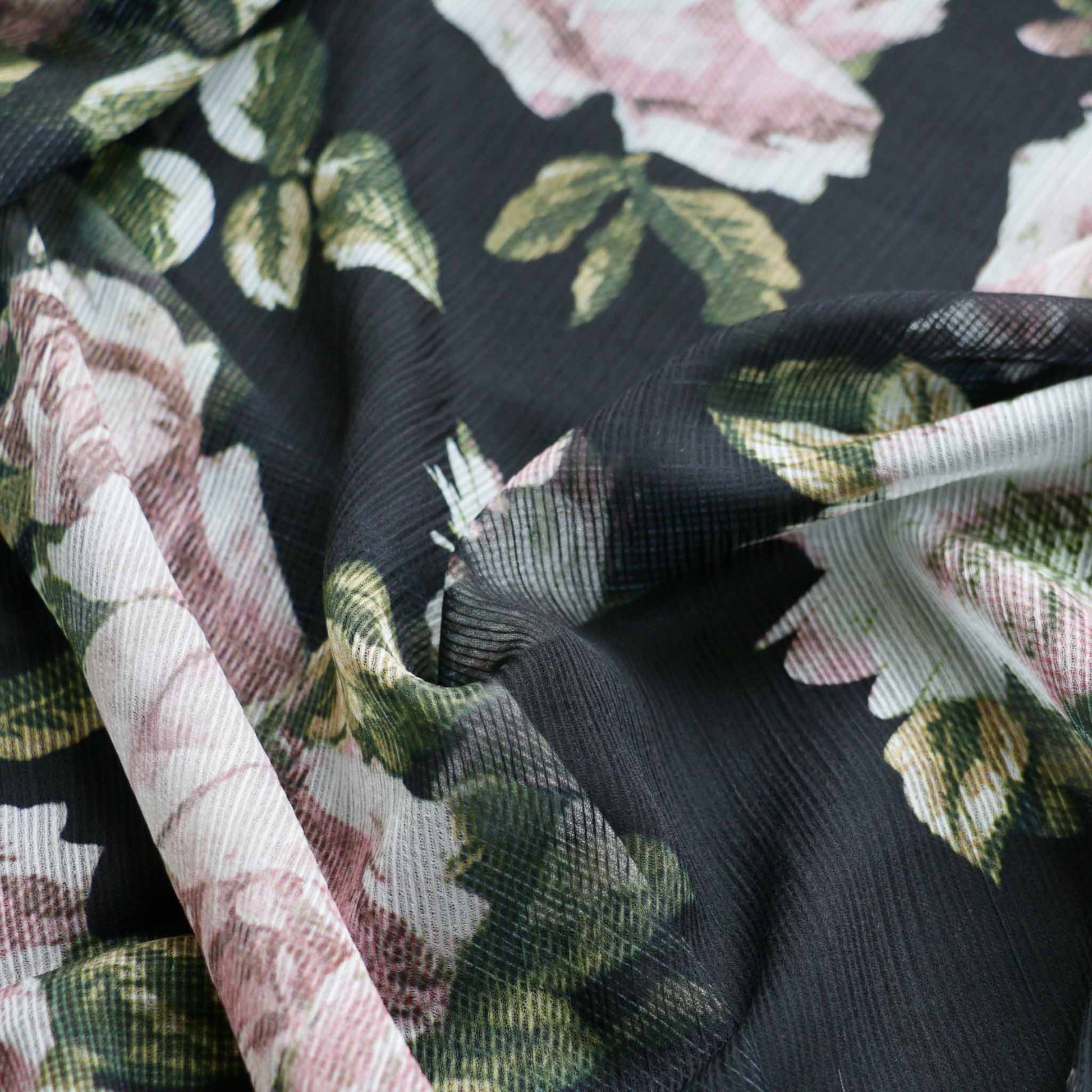 stretchy black crinkle chiffon polyester dressmaking fabric with pink flower print