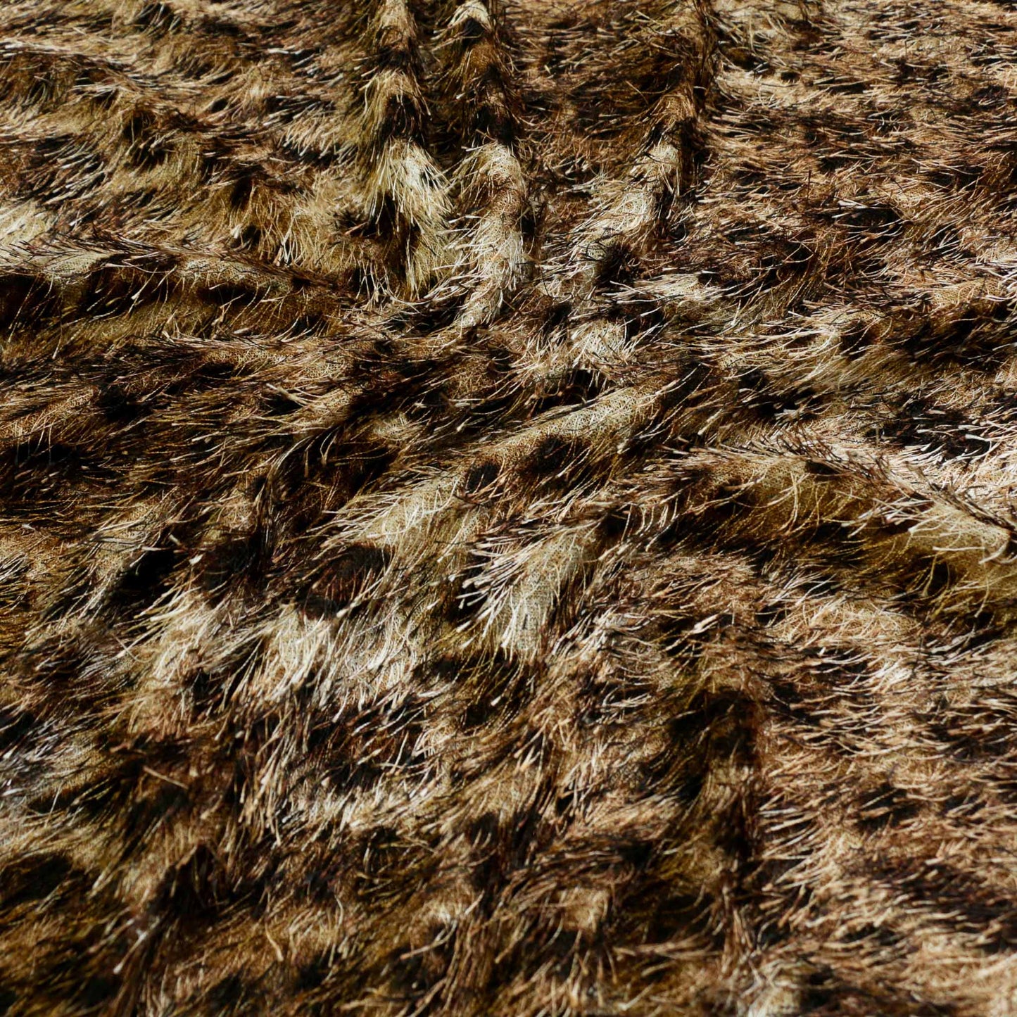 golden brown jaguar animal print eyelash dressmaking fabric