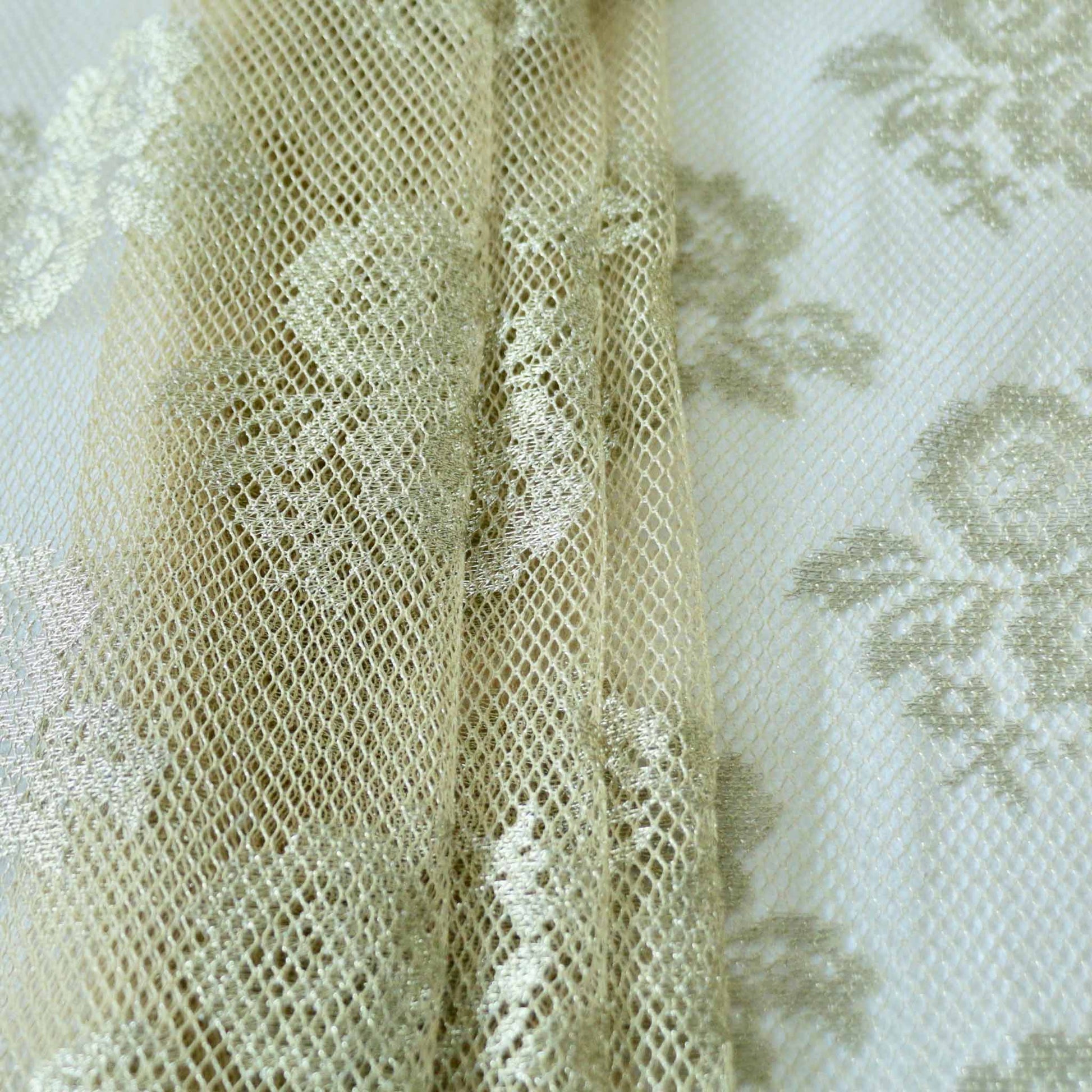 delicate gold lace with rose design dressmaking fabric