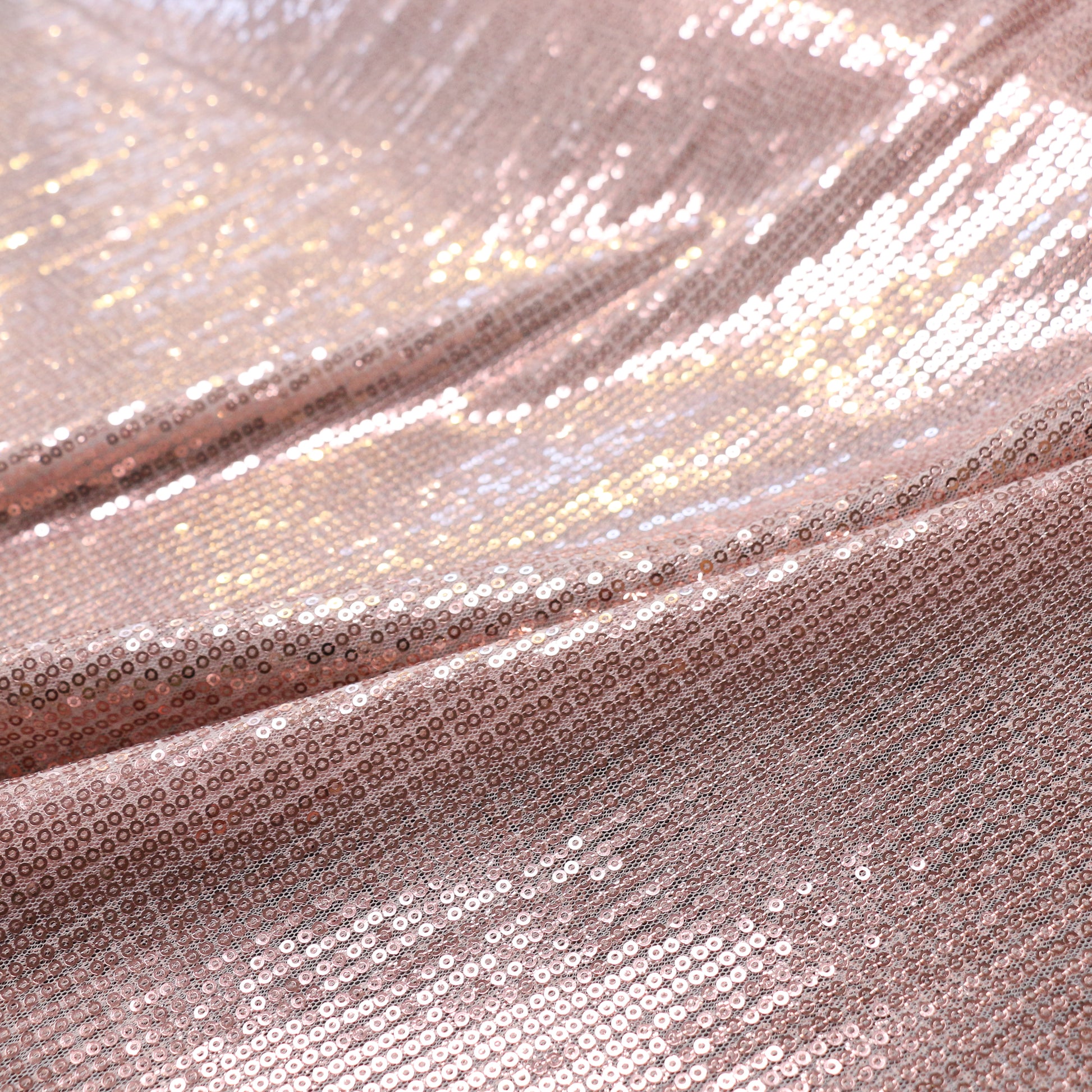 plain rose gold sequin mesh dressmaking fabric