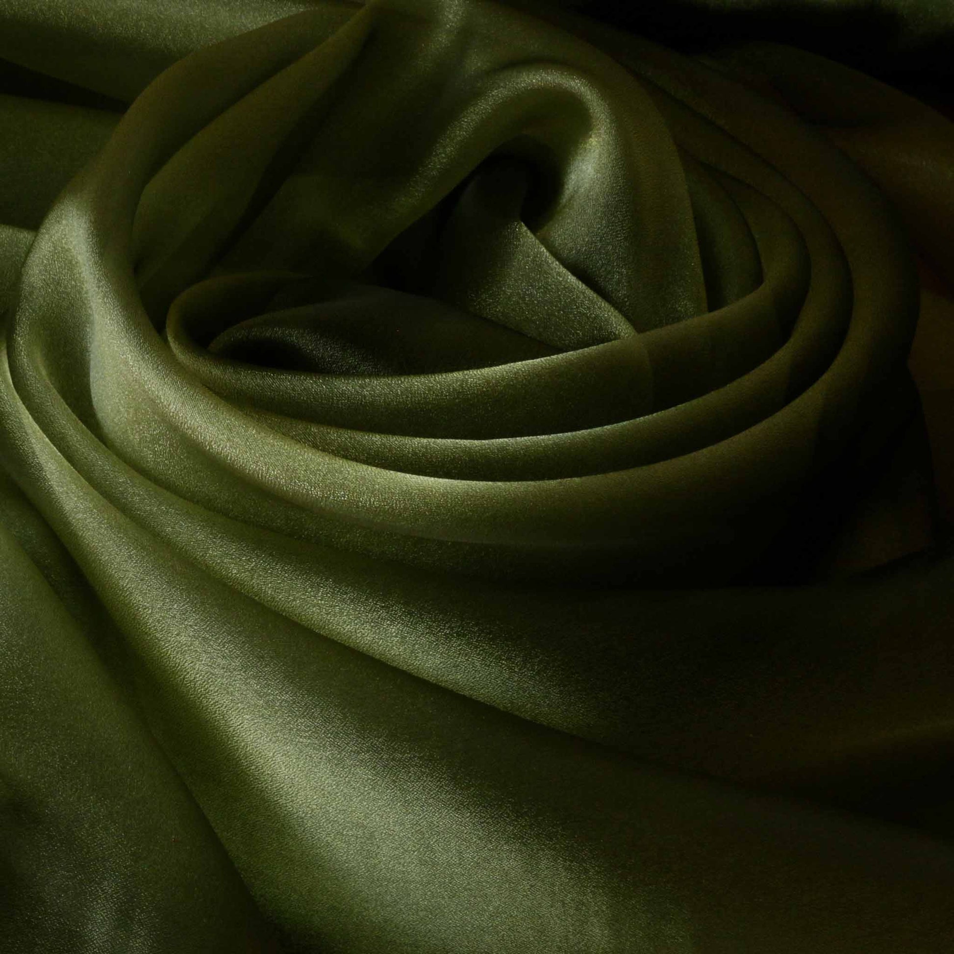 green and black crystal organza two tone dressmaking fabric