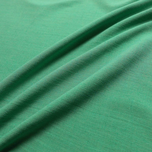 plain green linen viscose dressmaking fabric