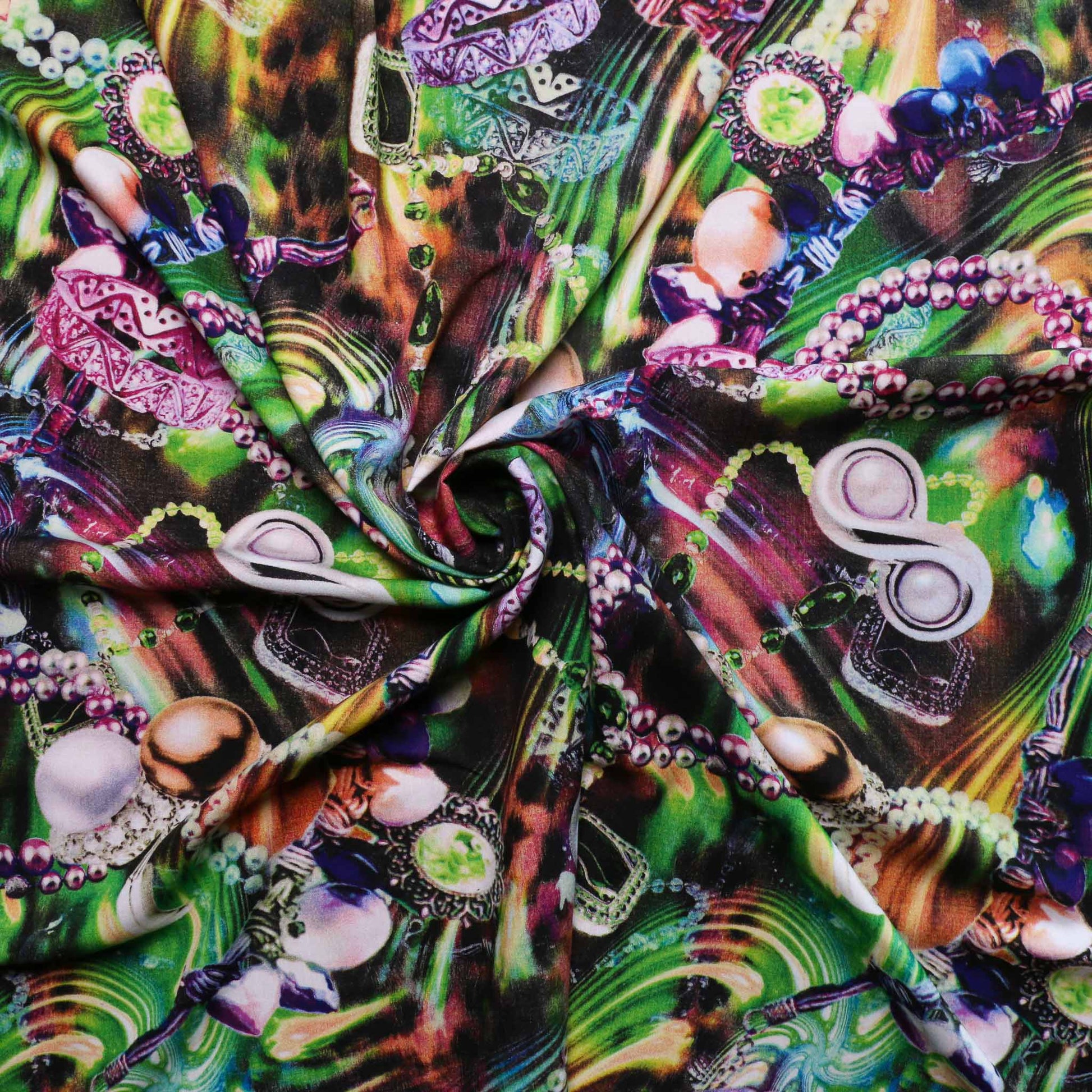 viscose challis dressmaking rayon fabric in green with floral printed jewellery in purple and blue
