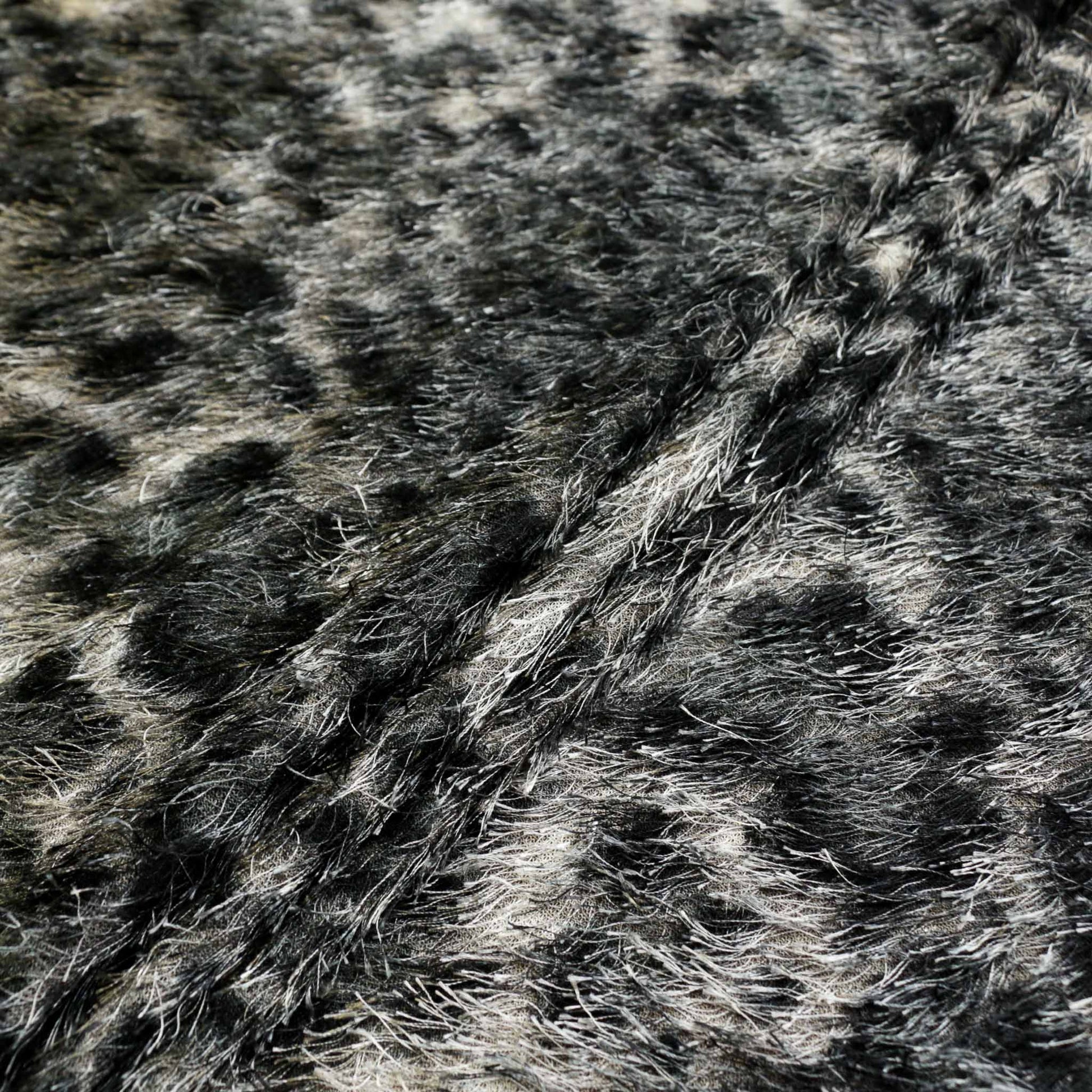 grey and black eyelash fabric jaguar print animal skin dressmaking fabric