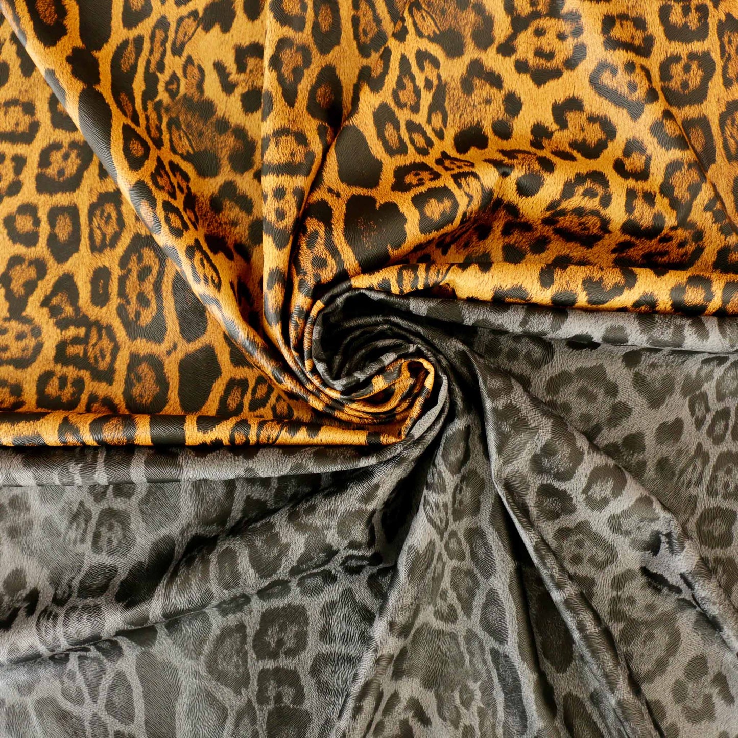 jaguar skin print leatherette dressmaking fabric in yellow and grey