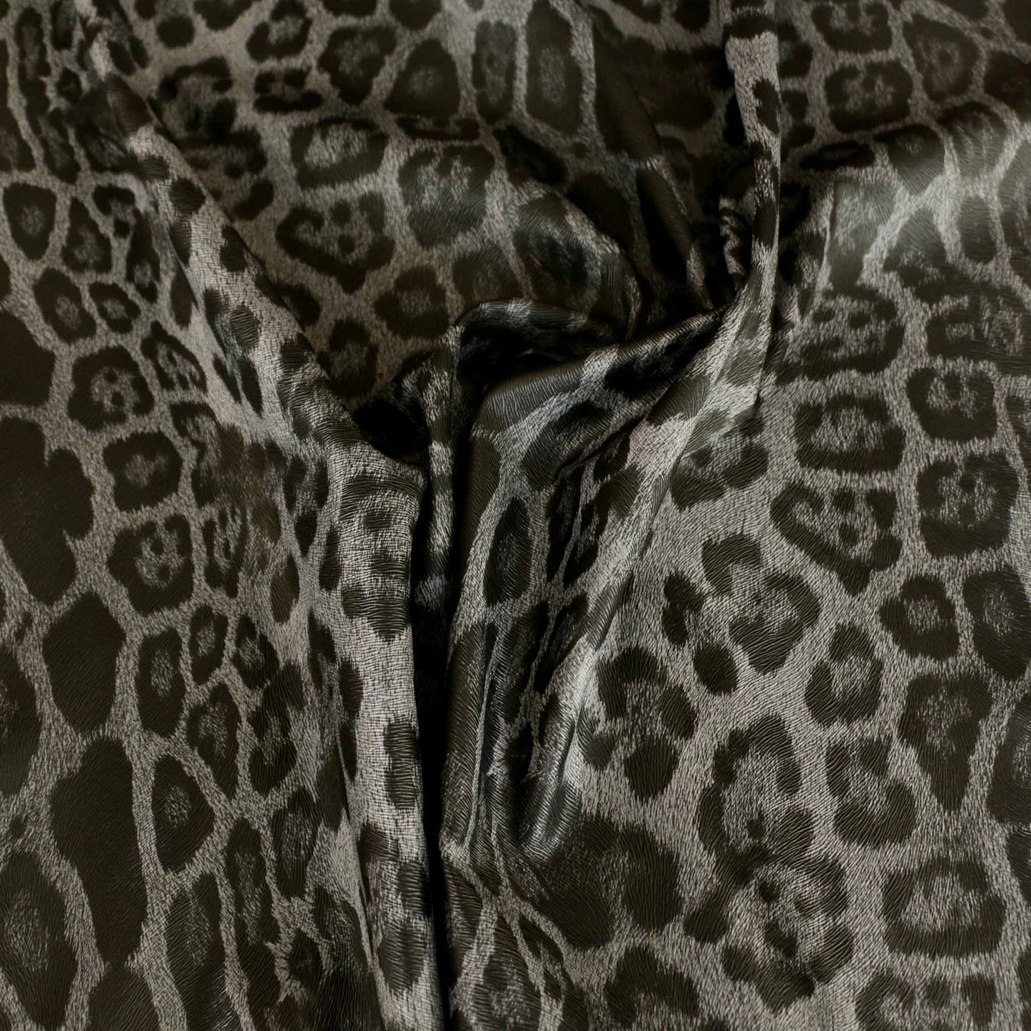 grey and black faux leather jaguar skin dressmaking pvc vinyl fabric