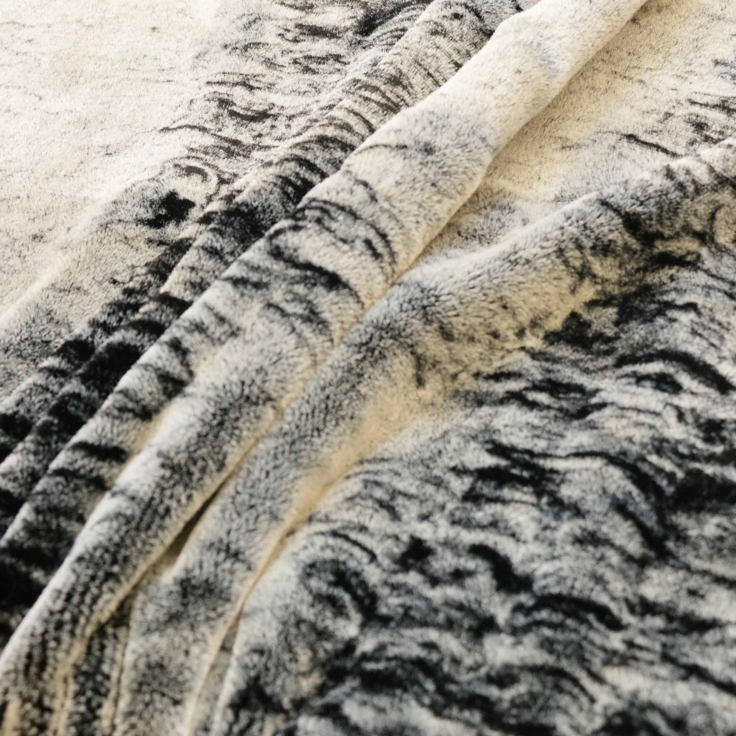 grey faux fur wolf skin dressmaking synthetic fabric