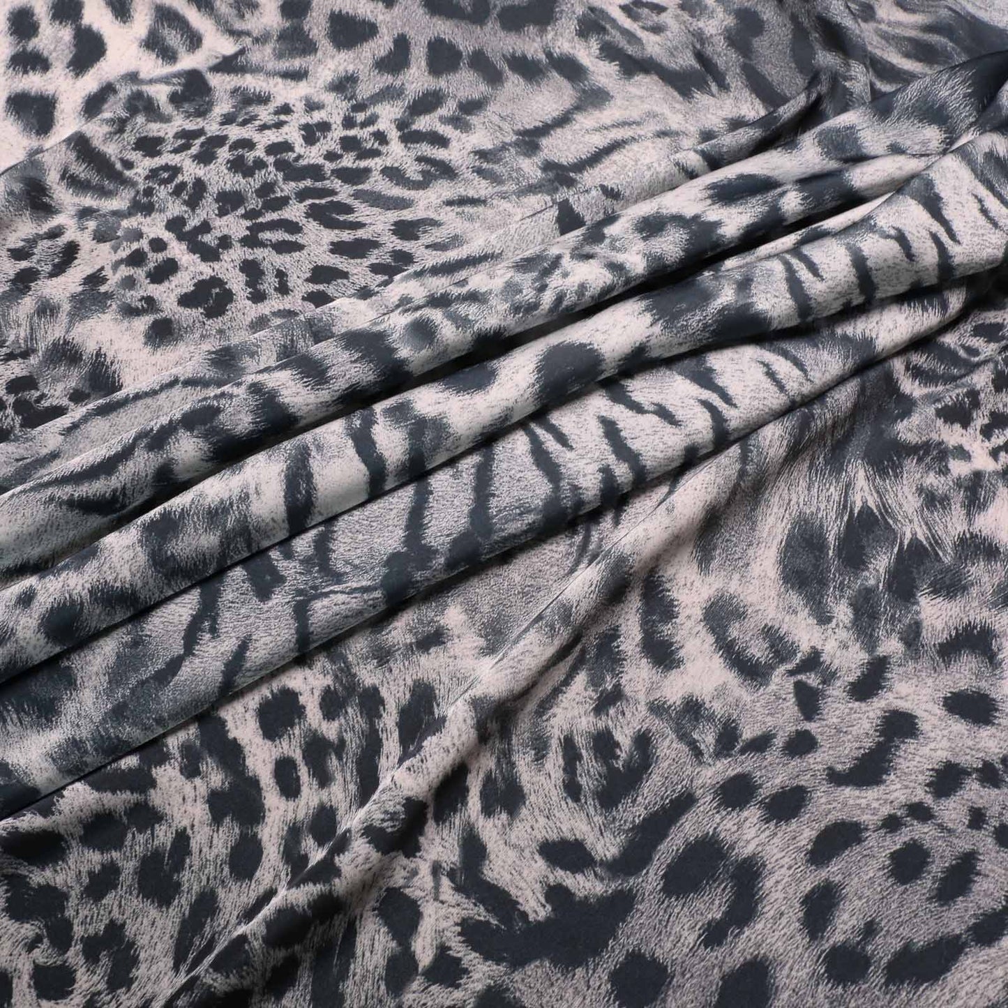 dark grey animal print design pale grey satin dressmaking fabric